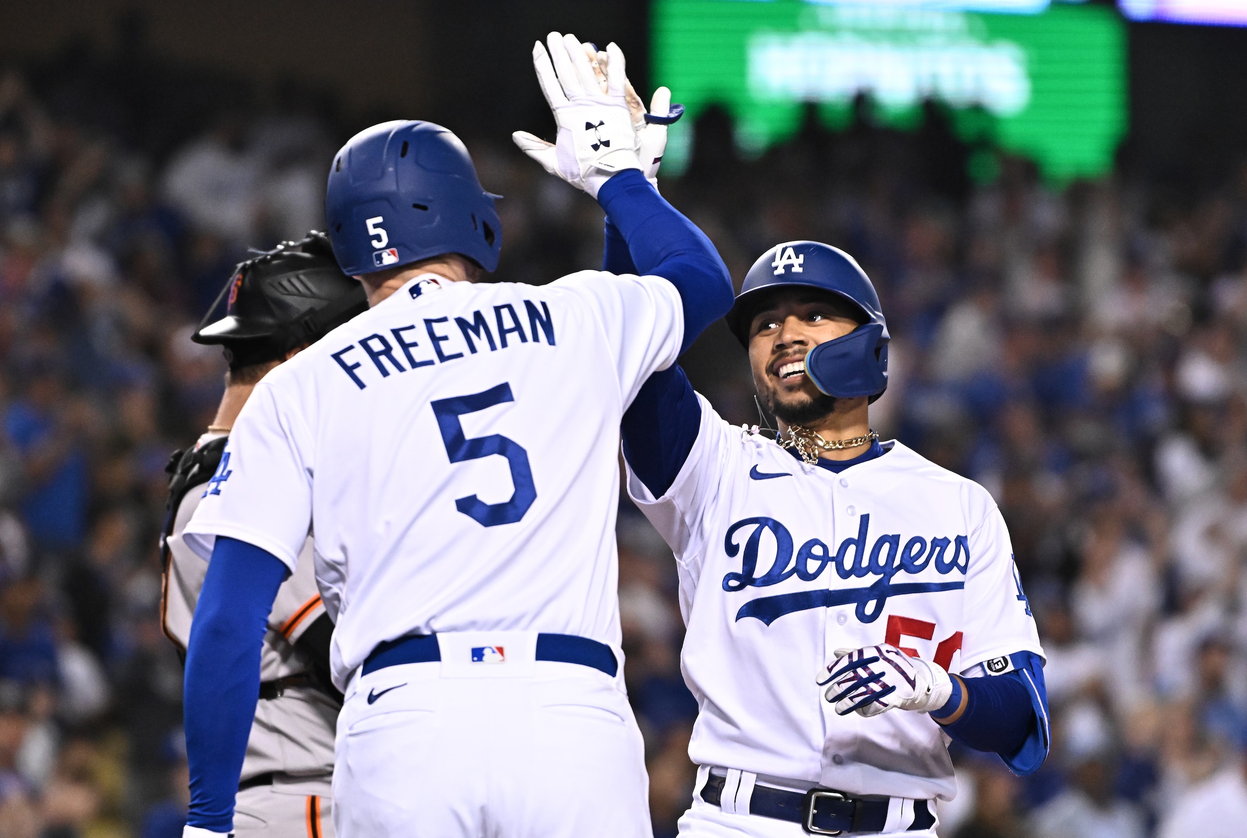Los Angeles, California May 4, 2022-Dodgers Mookie Betts celebrates his solo home run against the Giants with Freddie Freeman in the sixth inning at Dodger Stadium Wednesday. (Wally Skalij/Los Angeles Times via Getty Images)