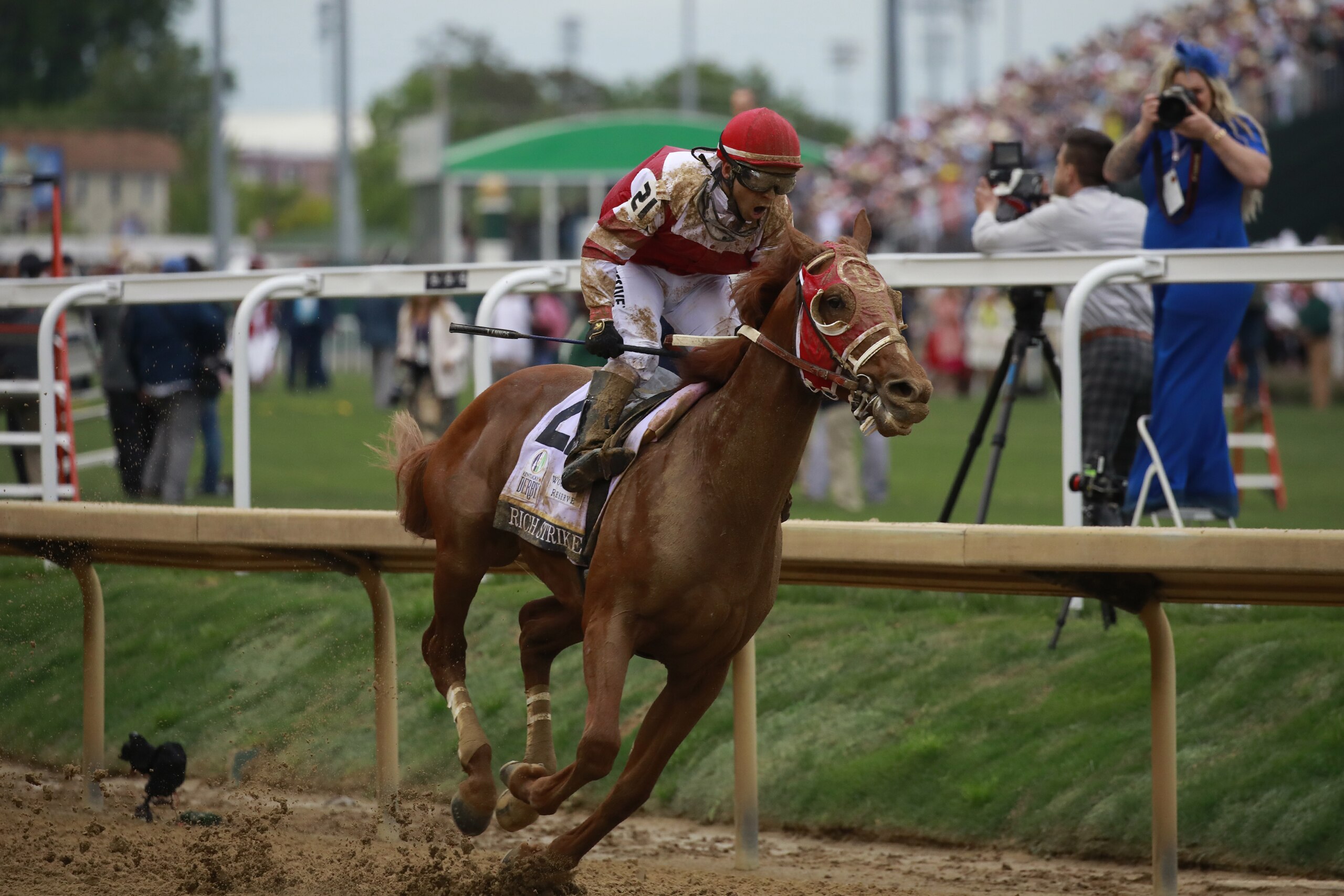 Rich Strike, ridden by jockey Sonny Leon, crosses the finish line to win the 148th running of The Kentucky Derby at Churchill Downs in Louisville, Kentucky, U.S., on Saturday, May 7, 2022. Rich Strike, an 80-1 long shot who only entered the Kentucky Derby field on Friday as a last-minute replacement for Ethereal Road, paid off big for bettors with one of the biggest upsets in Derby history. Photographer: Luke Sharrett/Bloomberg via Getty Images