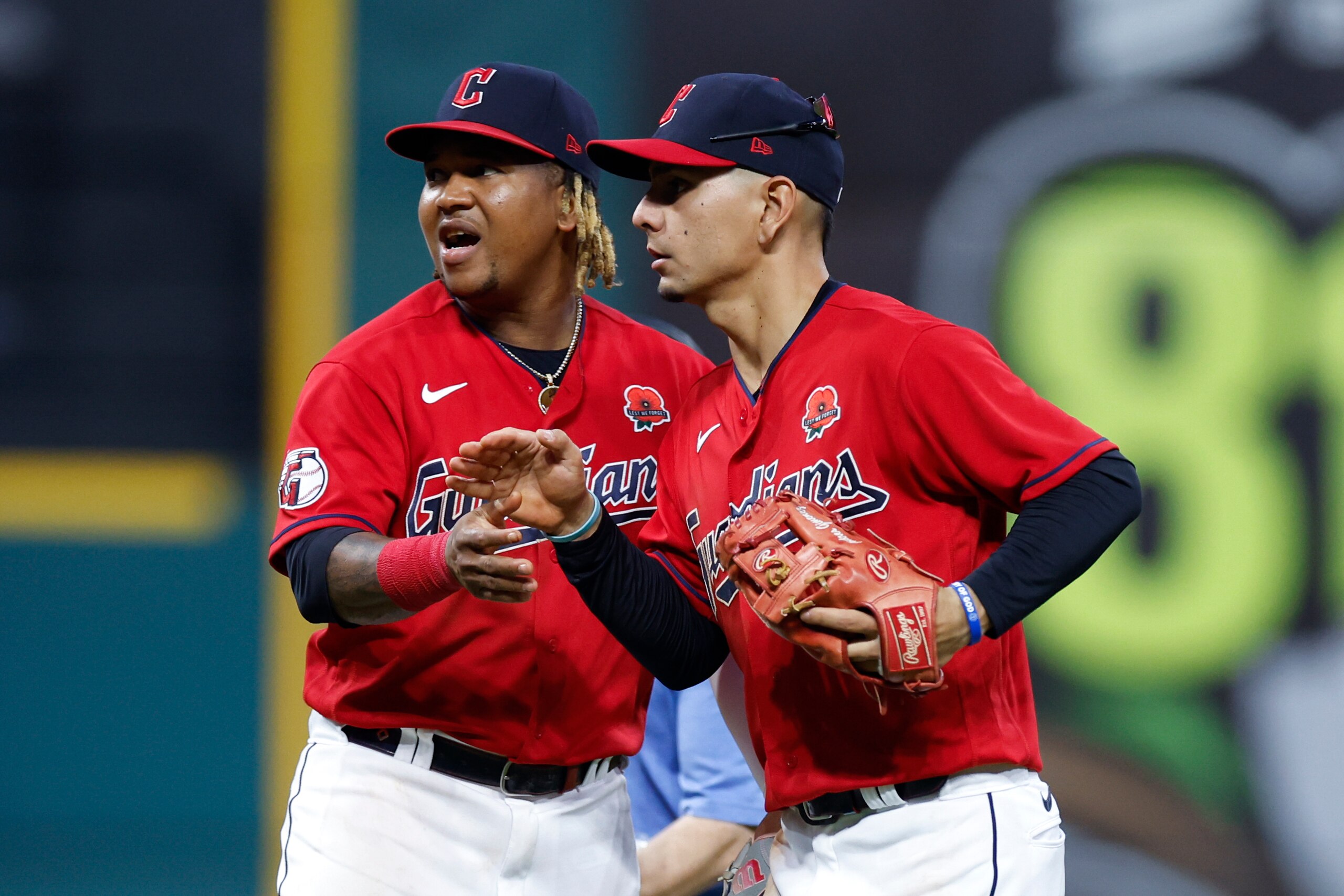 CLEVELAND, OH - MAY 30: Jose Ramirez #11 and Andres Gimenez #0 of the Cleveland Guardians celebrate a 7-3 win against the Kansas City Royals at Progressive Field on May 30, 2022 in Cleveland, Ohio. (Photo by Ron Schwane/Getty Images)