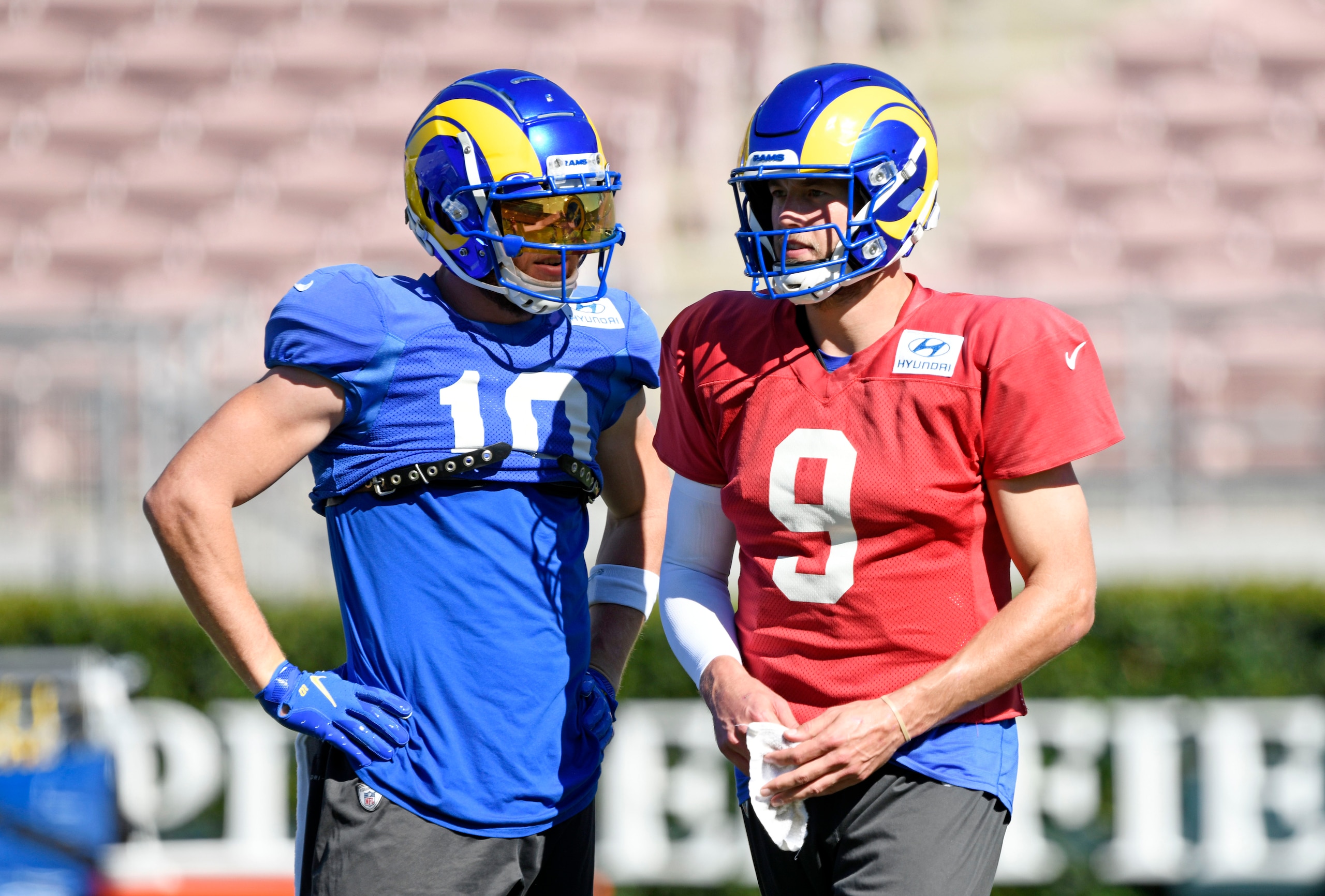 PASADENA, CA - FEBRUARY 10: Quarterback Matthew Stafford #9 and wide receiver Cooper Kupp #10 of the Los Angeles Rams talk during practice in preparation for Super Bowl LVI at the Rose Bowl on February 10, 2022 in Pasadena, California.The Rams play against the Cincinnati Bengals on Sunday. (Photo by Kevork Djansezian/Getty Images)