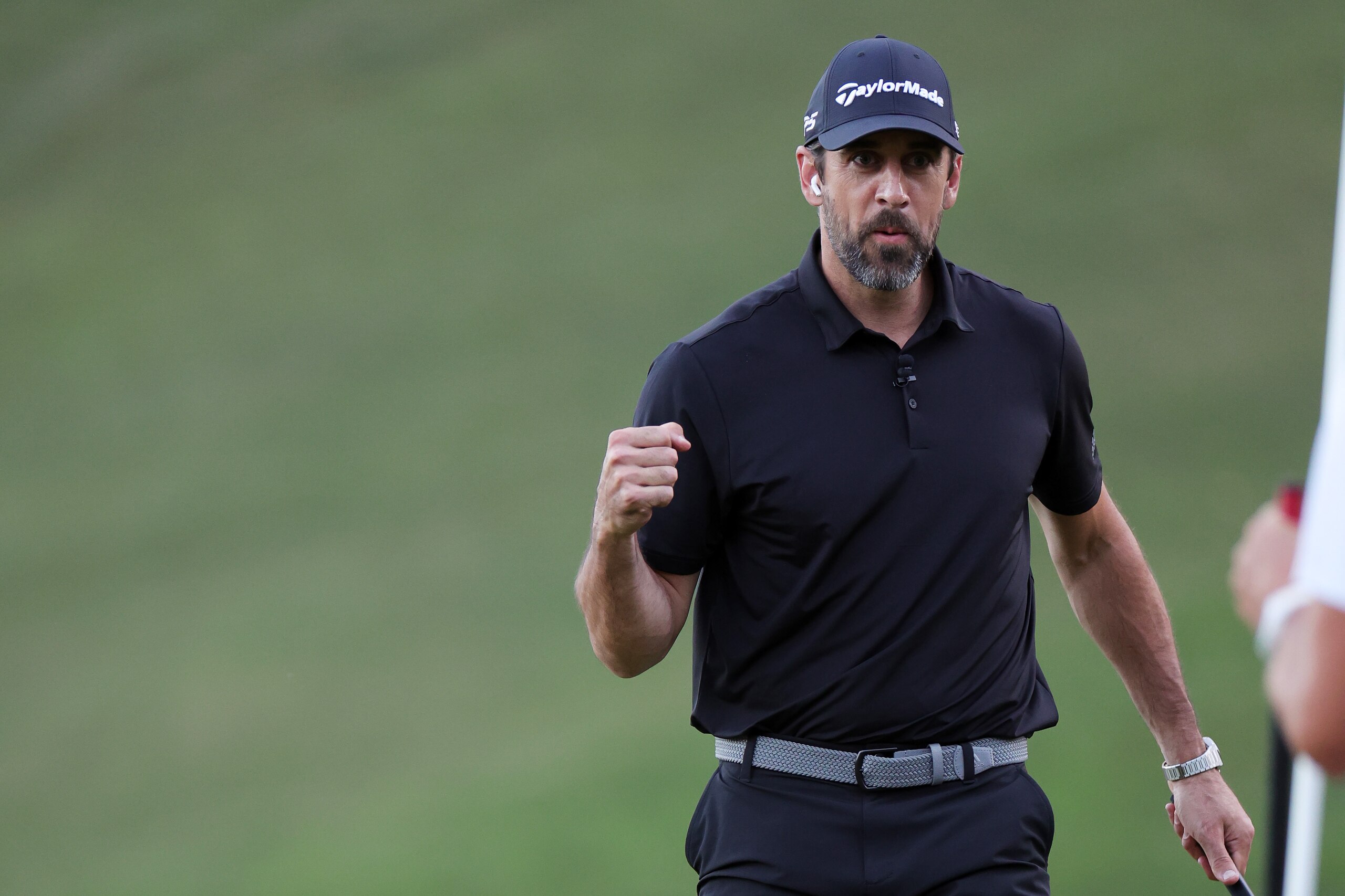 LAS VEGAS, NEVADA - JUNE 01: Aaron Rodgers reacts during Capital One's The Match VI - Brady & Rodgers v Allen & Mahomes at Wynn Golf Club on June 01, 2022 in Las Vegas, Nevada. (Photo by Carmen Mandato/Getty Images for The Match)