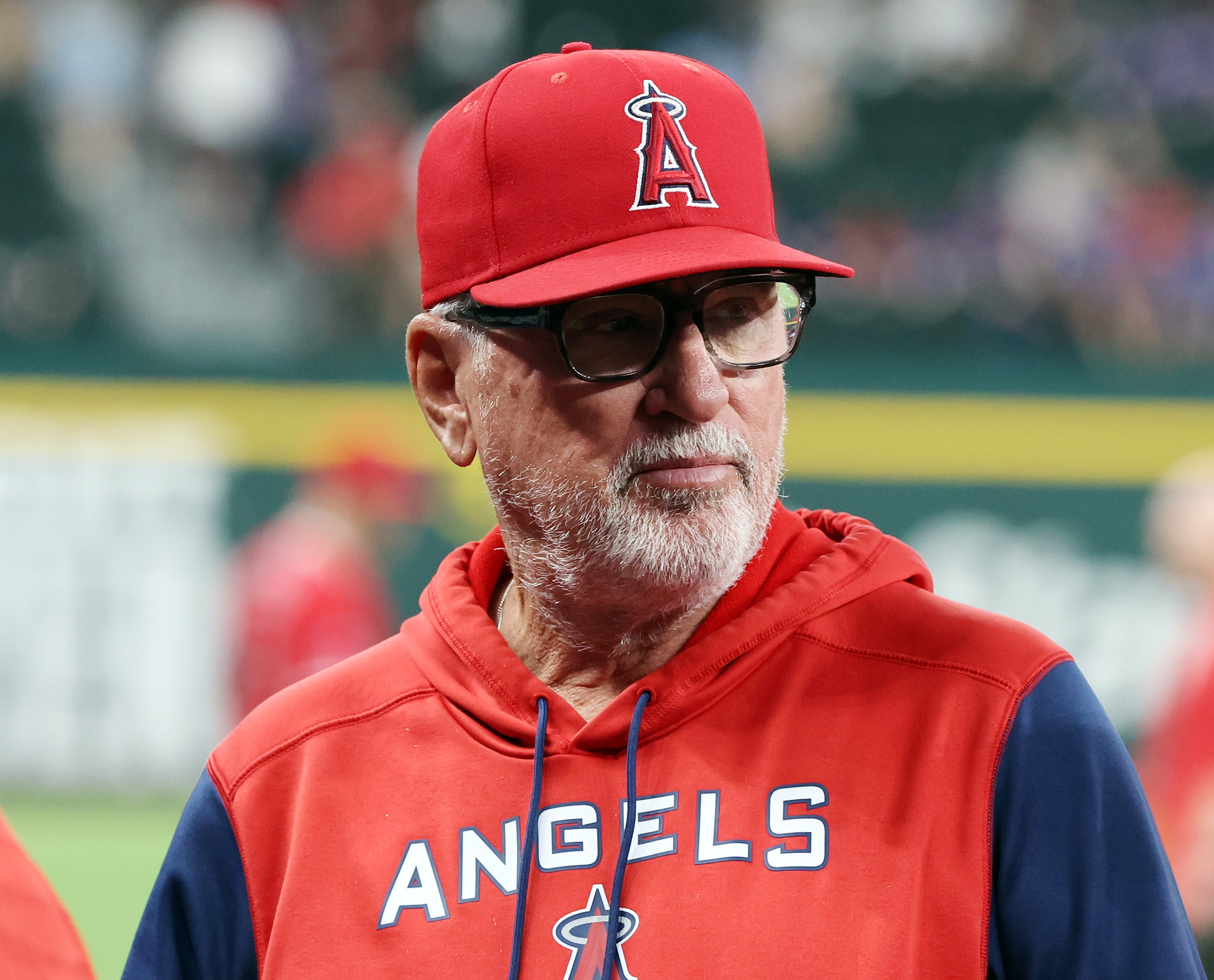 ARLINGTON, TEXAS - MAY 16: Joe Maddon #70 of the Los Angeles Angels looks on before the game against the Texas Rangers at Globe Life Field on May 16, 2022 in Arlington, Texas. (Photo by Richard Rodriguez/Getty Images)
