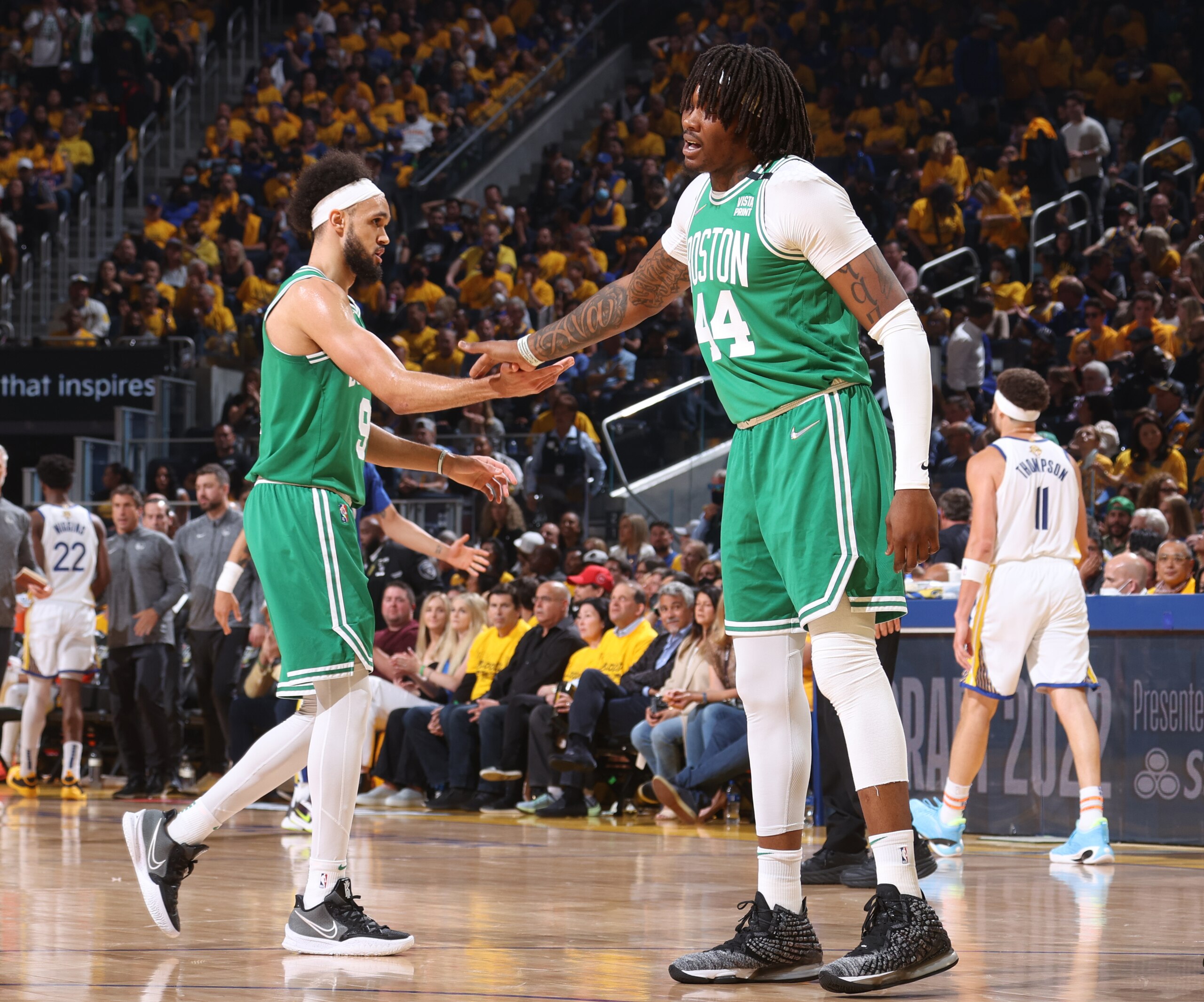 SAN FRANCISCO, CA - JUNE 5: Derrick White #9 and Robert Williams III #44 of the Boston Celtics high five during Game Two of the 2022 NBA Finals on June 5, 2022 at Chase Center in San Francisco, California. NOTE TO USER: User expressly acknowledges and agrees that, by downloading and or using this photograph, user is consenting to the terms and conditions of Getty Images License Agreement. Mandatory Copyright Notice: Copyright 2022 NBAE (Photo by Nathaniel S. Butler/NBAE via Getty Images)