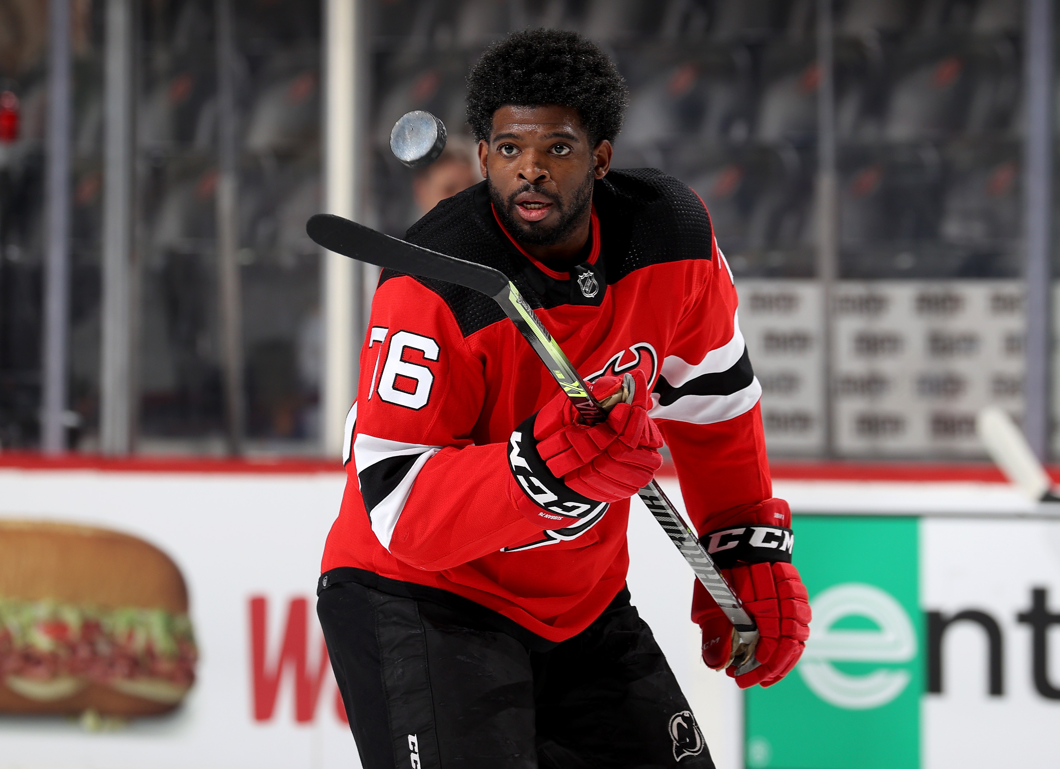 NEWARK, NEW JERSEY - APRIL 21: P.K. Subban #76 of the New Jersey Devils bounces the puck during warm ups before the game against the Buffalo Sabres at Prudential Center on April 21, 2022 in Newark, New Jersey. (Photo by Elsa/Getty Images)