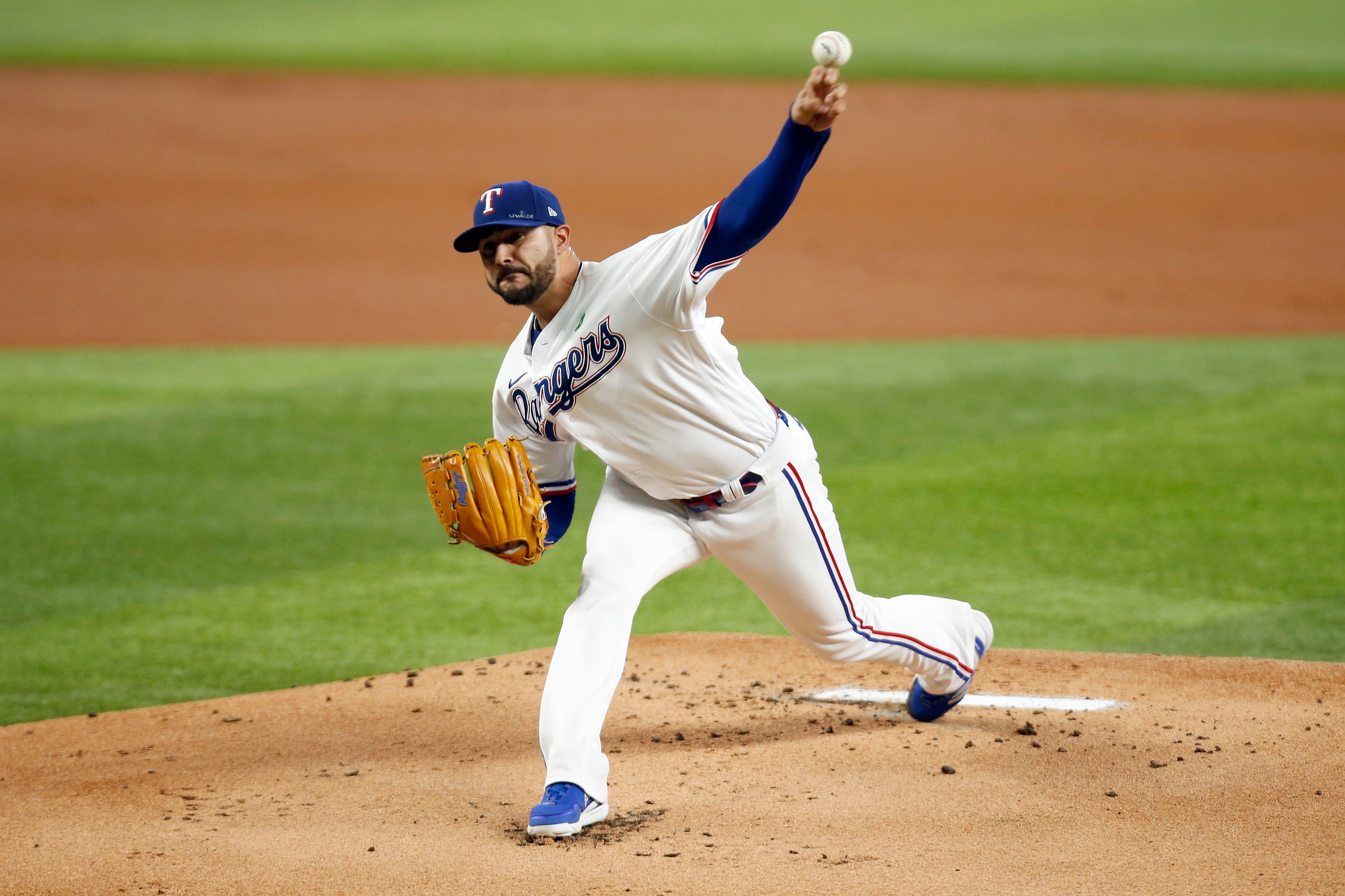 ARLINGTON, TEXAS - MAY 31: Martin Perez #54 of the Texas Rangers pitches against the Tampa Bay Rays in the first inning at Globe Life Field on May 31, 2022 in Arlington, Texas. (Photo by Tim Heitman/Getty Images)