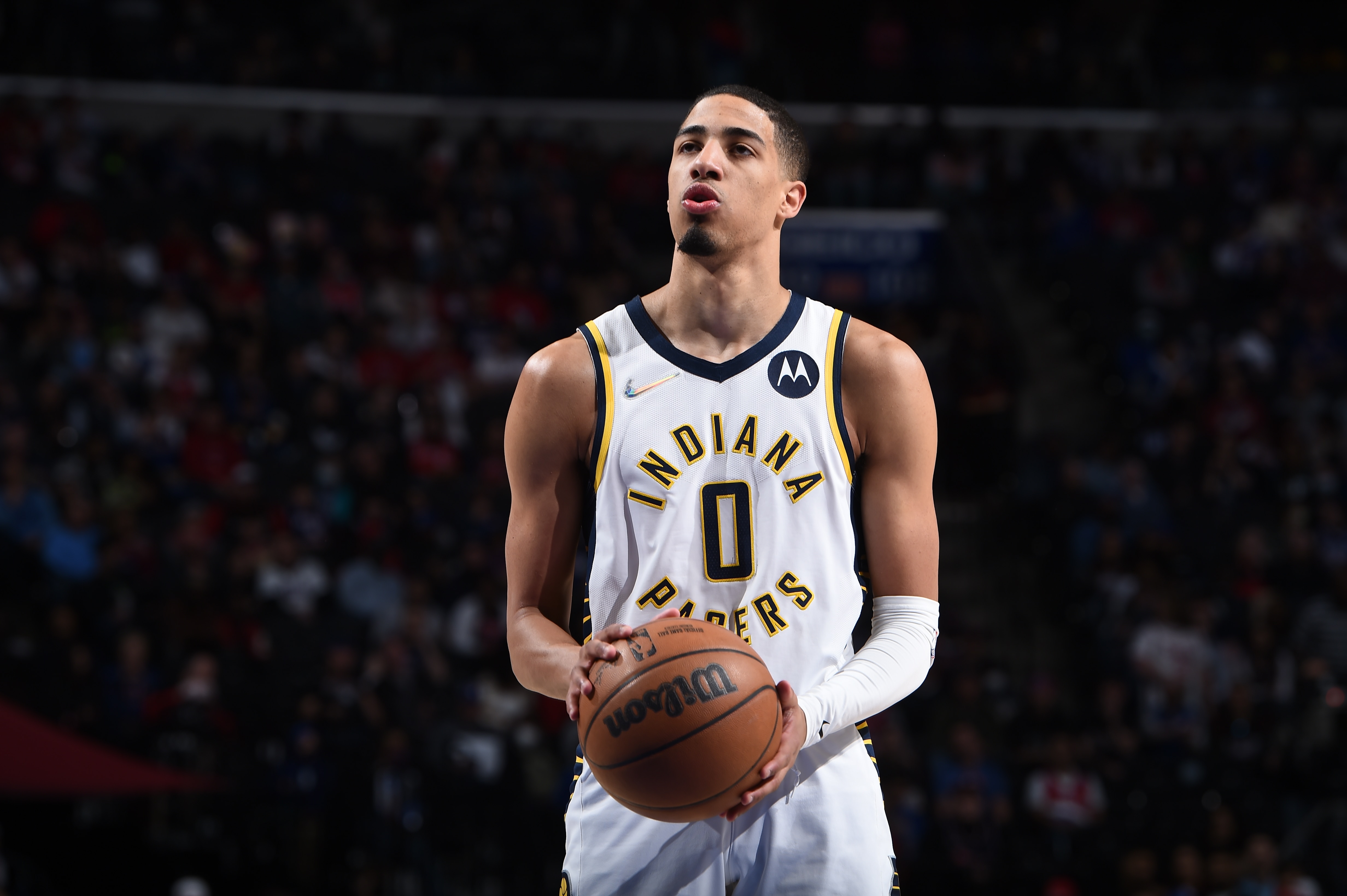 PHILADELPHIA, PA - APRIL 9: Tyrese Haliburton #0 of the Indiana Pacers shoots a free throw during the game against the Philadelphia 76ers on April 9, 2022 at the Wells Fargo Center in Philadelphia, Pennsylvania NOTE TO USER: User expressly acknowledges and agrees that, by downloading and/or using this Photograph, user is consenting to the terms and conditions of the Getty Images License Agreement. Mandatory Copyright Notice: Copyright 2022 NBAE (Photo by David Dow/NBAE via Getty Images)