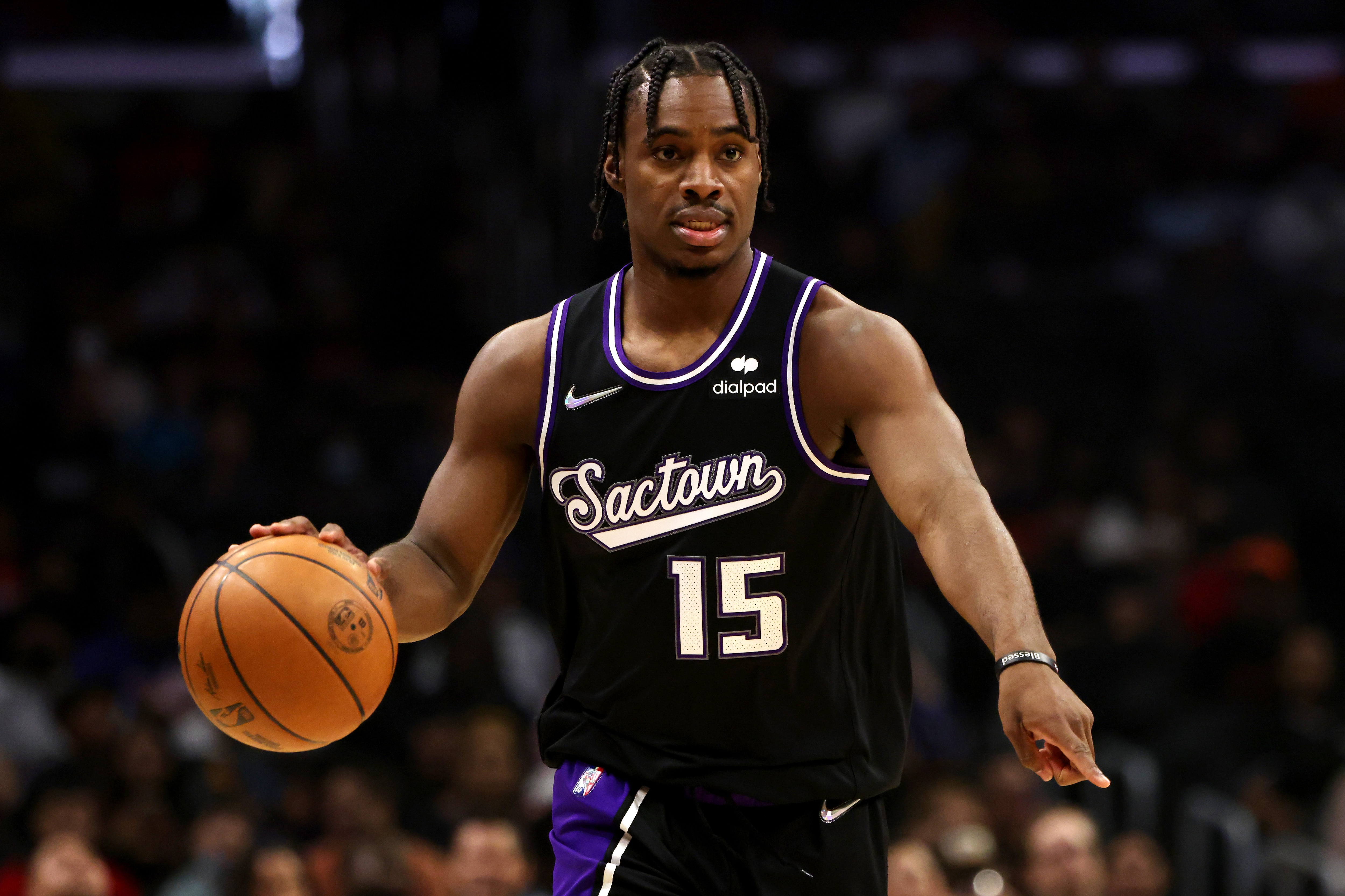 LOS ANGELES, CALIFORNIA - APRIL 09: Davion Mitchell #15 of the Sacramento Kings shoots the puck during the first half against the Los Angeles Clippers at Crypto.com Arena on April 09, 2022 in Los Angeles, California. NOTE TO USER: User expressly acknowledges and agrees that, by downloading and or using this photograph, User is consenting to the terms and conditions of the Getty Images License Agreement. (Photo by Katelyn Mulcahy/Getty Images)