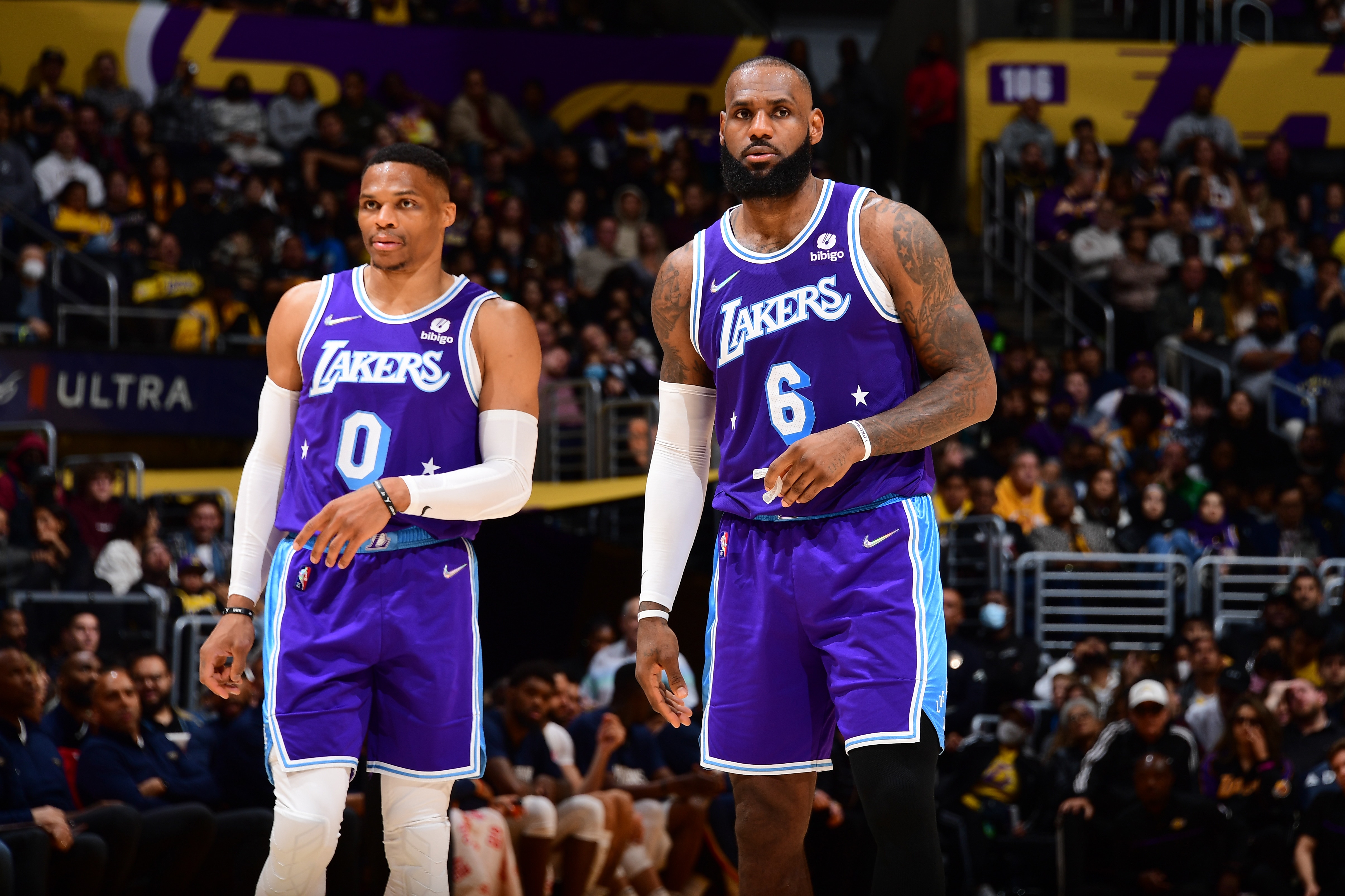 LOS ANGELES, CA - APRIL 1: Russel Westbrook #0 and LeBron James #6 of the Los Angeles Lakers look on during the game against the New Orleans Pelicans on April 1, 2022 at Crypto.Com Arena in Los Angeles, California. NOTE TO USER: User expressly acknowledges and agrees that, by downloading and/or using this Photograph, user is consenting to the terms and conditions of the Getty Images License Agreement. Mandatory Copyright Notice: Copyright 2022 NBAE (Photo by Adam Pantozzi/NBAE via Getty Images)