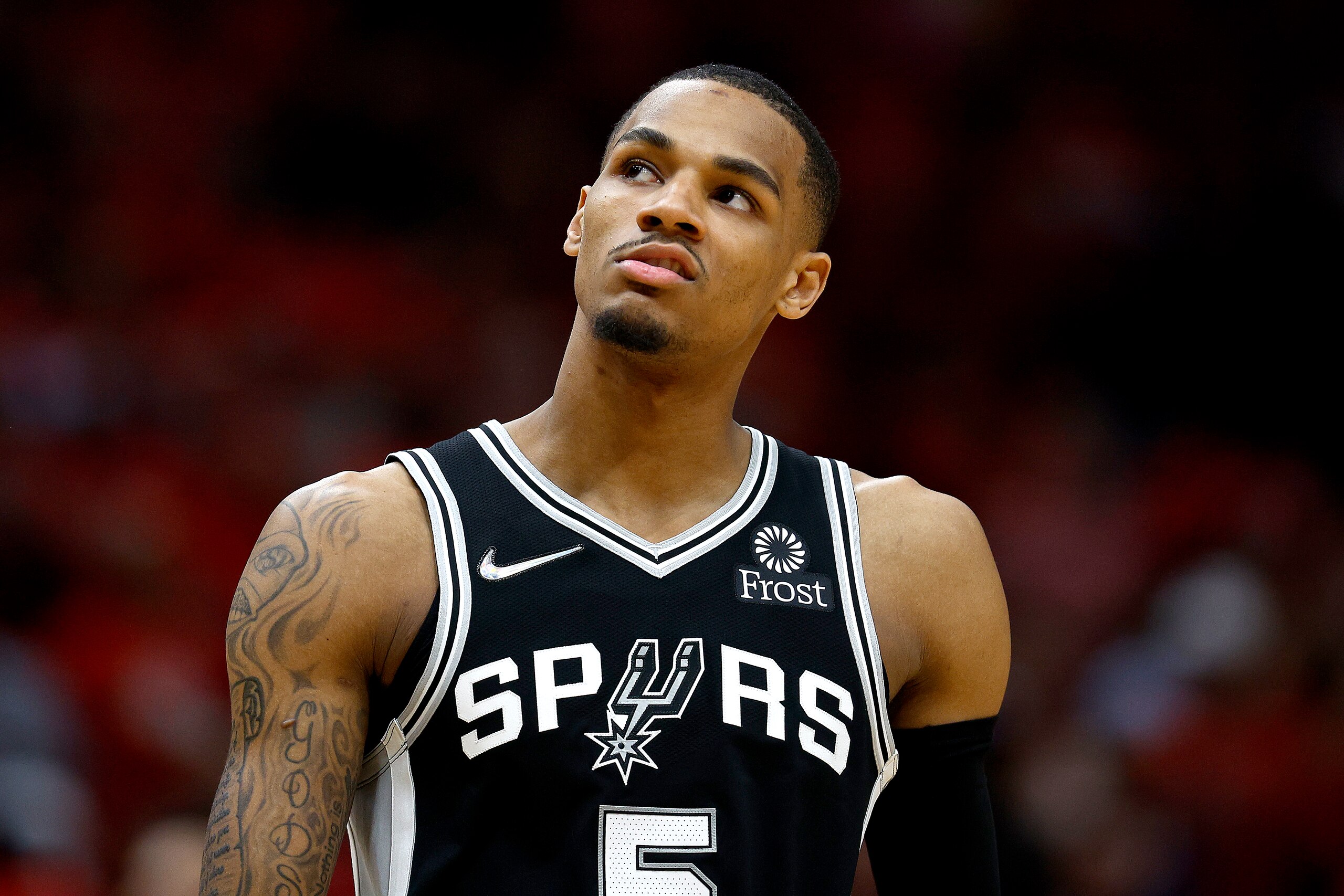 NEW ORLEANS, LOUISIANA - APRIL 13: Dejounte Murray #5 of the San Antonio Spurs stands on the court during the first quarter of the 2022 NBA Play-In Tournament at Smoothie King Center on April 13, 2022 in New Orleans, Louisiana. NOTE TO USER: User expressly acknowledges and agrees that, by downloading and or using this photograph, User is consenting to the terms and conditions of the Getty Images License Agreement. (Photo by Sean Gardner/Getty Images) NEW ORLEANS, LOUISIANA - APRIL 13: Dejounte Murray #5 of the San Antonio Spurs stands on the court during the first quarter of the 2022 NBA Play-In Tournament at Smoothie King Center on April 13, 2022 in New Orleans, Louisiana. NOTE TO USER: User expressly acknowledges and agrees that, by downloading and or using this photograph, User is consenting to the terms and conditions of the Getty Images License Agreement. (Photo by Sean Gardner/Getty Images)