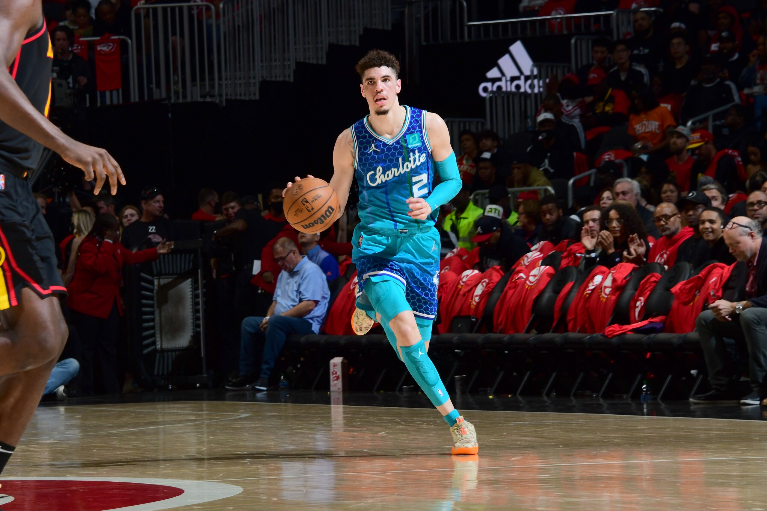 ATLANTA, GA - APRIL 13: LaMelo Ball #2 of the Charlotte Hornets dribbles the ball during the game against the Atlanta Hawks during the 2022 Play-In Tournament on April 13, 2022 at State Farm Arena in Atlanta, Georgia. NOTE TO USER: User expressly acknowledges and agrees that, by downloading and/or using this Photograph, user is consenting to the terms and conditions of the Getty Images License Agreement. Mandatory Copyright Notice: Copyright 2022 NBAE (Photo by Scott Cunningham/NBAE via Getty Images) ATLANTA, GA - APRIL 13: LaMelo Ball #2 of the Charlotte Hornets dribbles the ball during the game against the Atlanta Hawks during the 2022 Play-In Tournament on April 13, 2022 at State Farm Arena in Atlanta, Georgia. NOTE TO USER: User expressly acknowledges and agrees that, by downloading and/or using this Photograph, user is consenting to the terms and conditions of the Getty Images License Agreement. Mandatory Copyright Notice: Copyright 2022 NBAE (Photo by Scott Cunningham/NBAE via Getty Images)