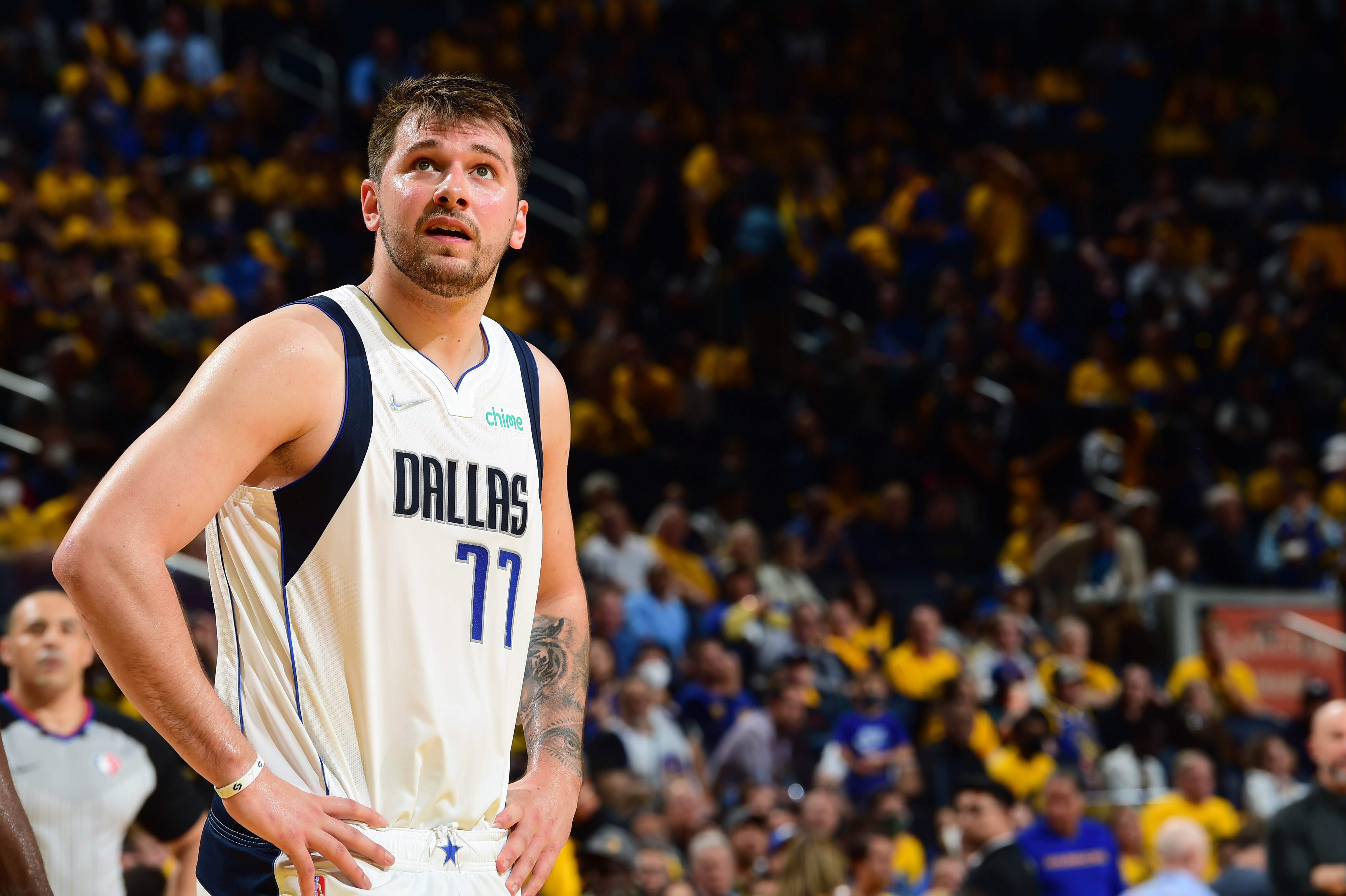 SAN FRANCISCO, CA - MAY 26: Luka Doncic #77 of the Dallas Mavericks looks on during Game 5 of the 2022 NBA Playoffs Western Conference Finals on March 26, 2022 at Chase Center in San Francisco, California. NOTE TO USER: User expressly acknowledges and agrees that, by downloading and or using this photograph, user is consenting to the terms and conditions of Getty Images License Agreement. Mandatory Copyright Notice: Copyright 2022 NBAE (Photo by Noah Graham/NBAE via Getty Images)