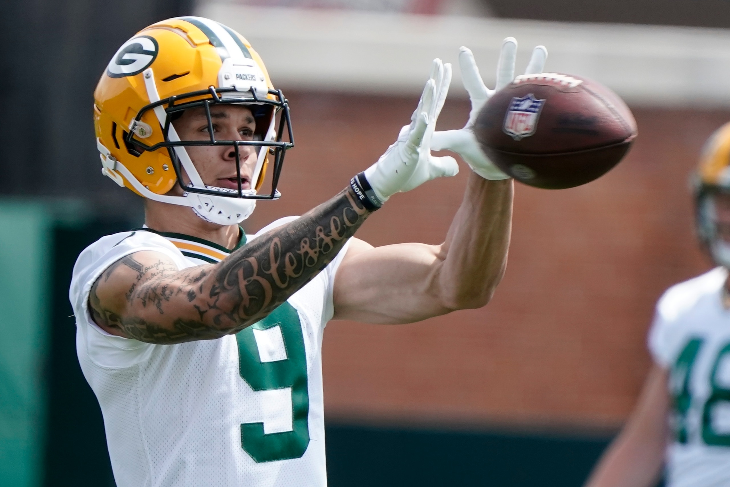 Green Bay Packers' Christian Watson runs a drill at the NFL football team's practice field training camp Tuesday, May 24, 2022, in Green Bay, Wis. (AP Photo/Morry Gash) Green Bay Packers' Christian Watson runs a drill at the NFL football team's practice field training camp Tuesday, May 24, 2022, in Green Bay, Wis. (AP Photo/Morry Gash)