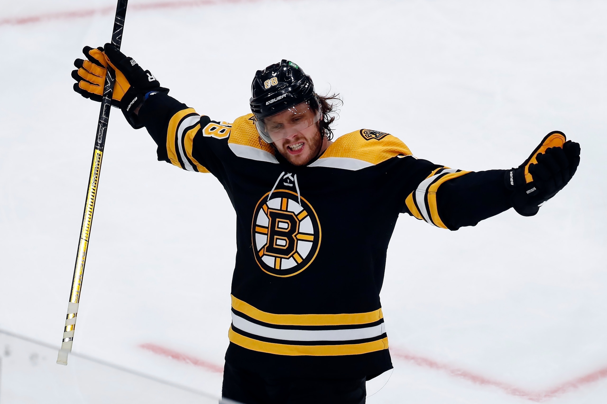 Boston Bruins' David Pastrnak celebrates his goal during the second period of Game 3 of an NHL hockey Stanley Cup first-round playoff series against the Carolina Hurricanes, Friday, May 6, 2022, in Boston. (AP Photo/Michael Dwyer)