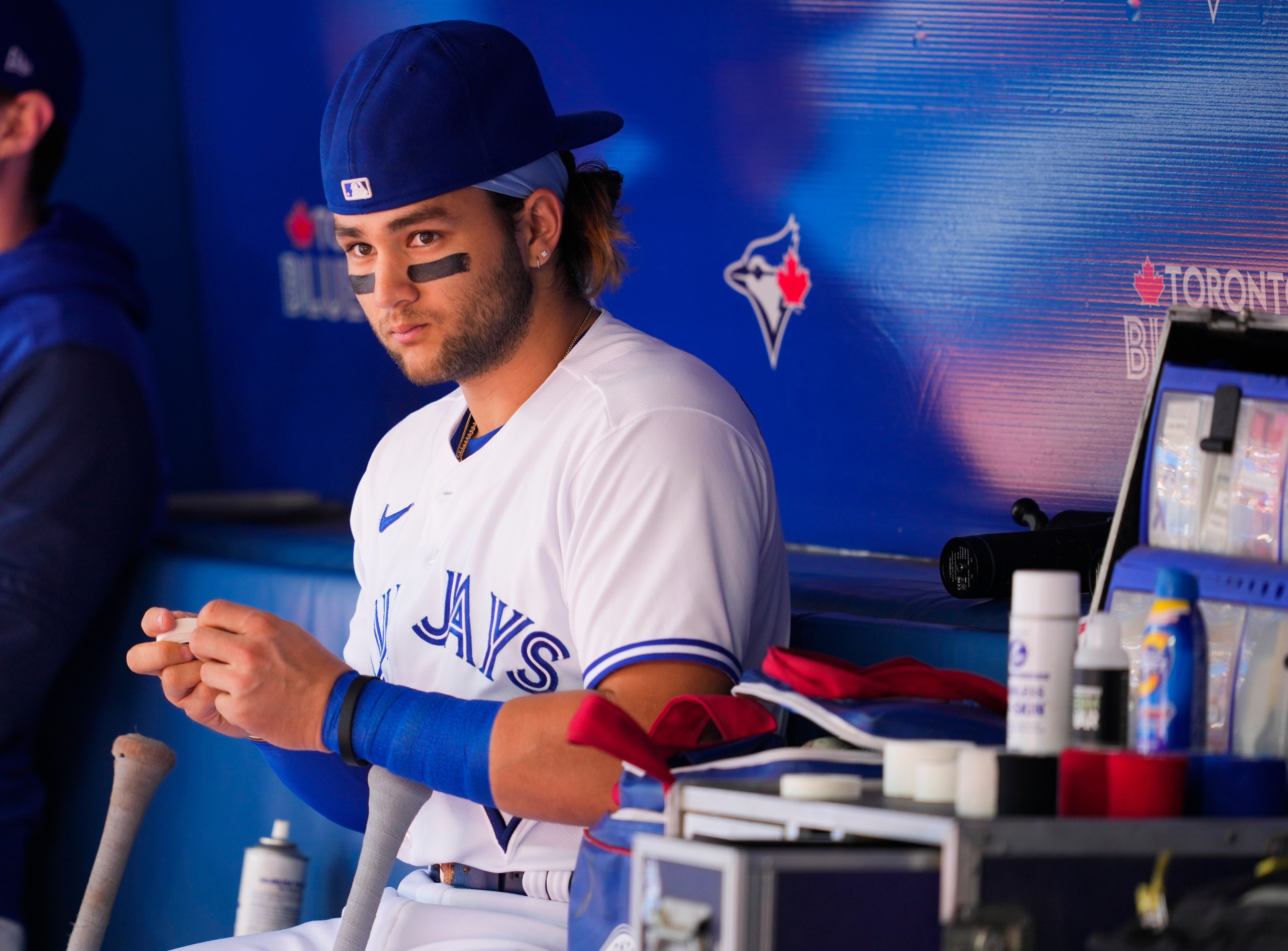 TORONTO, ON - JUNE 4: Bo Bichette #11 of the Toronto Blue Jays prepares his bat before playing the Minnesota Twins in their MLB game at the Rogers Centre on June 4, 2022 in Toronto, Ontario, Canada. (Photo by Mark Blinch/Getty Images)