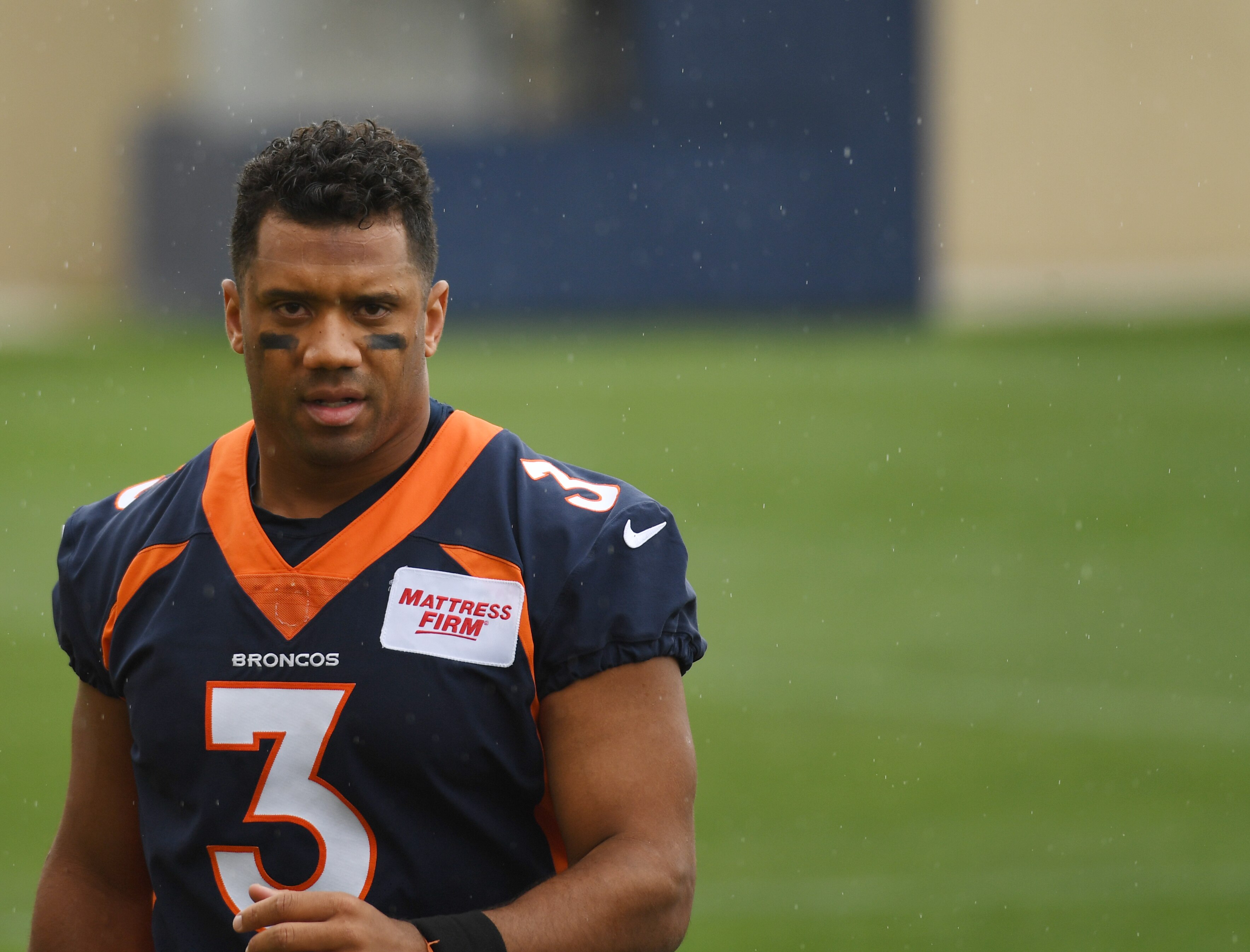 CENTENNIAL, COLORADO - MAY 31: Russell Wilson (3) of the Denver Broncos runs off the field after organized team activities at UCHealth Training Center on May 31, 2022 in Centennial, Colorado. (Photo by RJ Sangosti/MediaNews Group/The Denver Post via Getty Images)"n"n