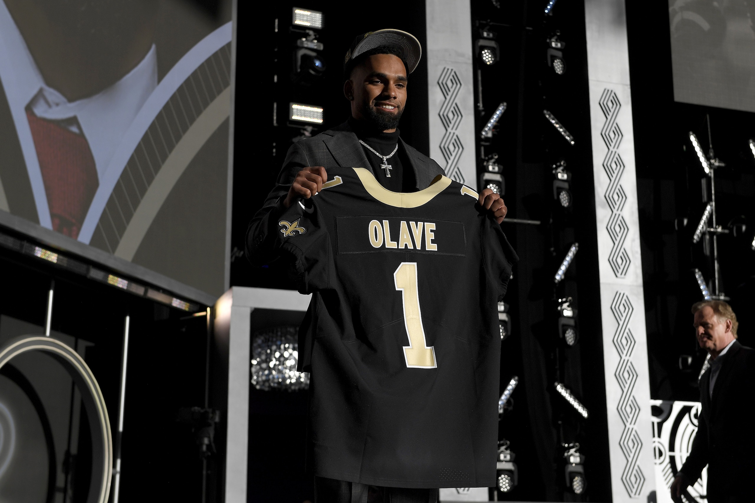 LAS VEGAS, NEVADA - APRIL 28: Chris Olave poses onstage after being selected 11th by the New Orleans Saints during round one of the 2022 NFL Draft on April 28, 2022 in Las Vegas, Nevada. (Photo by David Becker/Getty Images) LAS VEGAS, NEVADA - APRIL 28: Chris Olave poses onstage after being selected 11th by the New Orleans Saints during round one of the 2022 NFL Draft on April 28, 2022 in Las Vegas, Nevada. (Photo by David Becker/Getty Images)