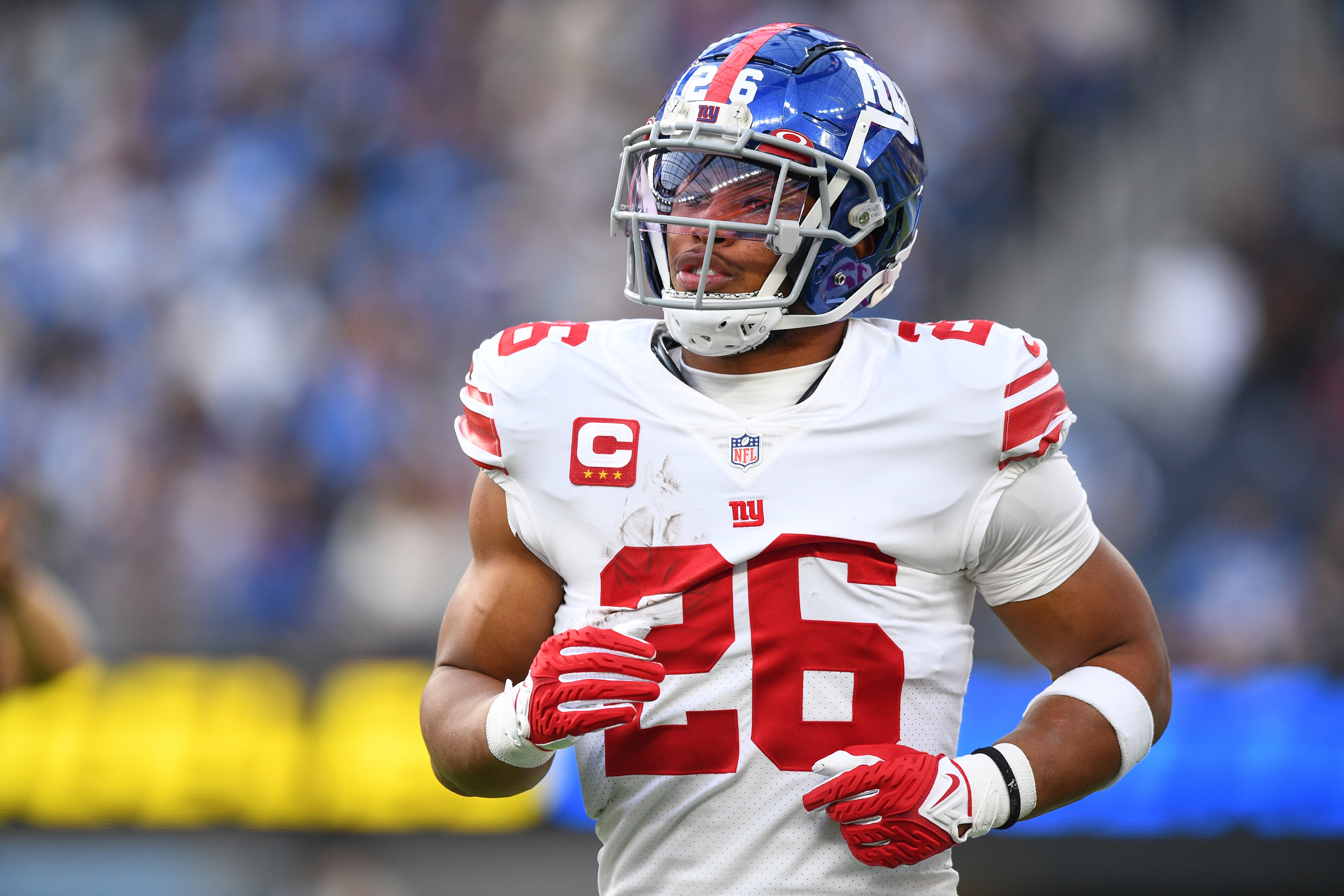 INGLEWOOD, CA - DECEMBER 12: New York Giants Running Back Saquon Barkley (26) looks on during the NFL game between the New York Giants and the Los Angeles Chargers on December 12, 2021, at SoFi Stadium in Inglewood, CA. (Photo by Brian Rothmuller/Icon Sportswire via Getty Images)