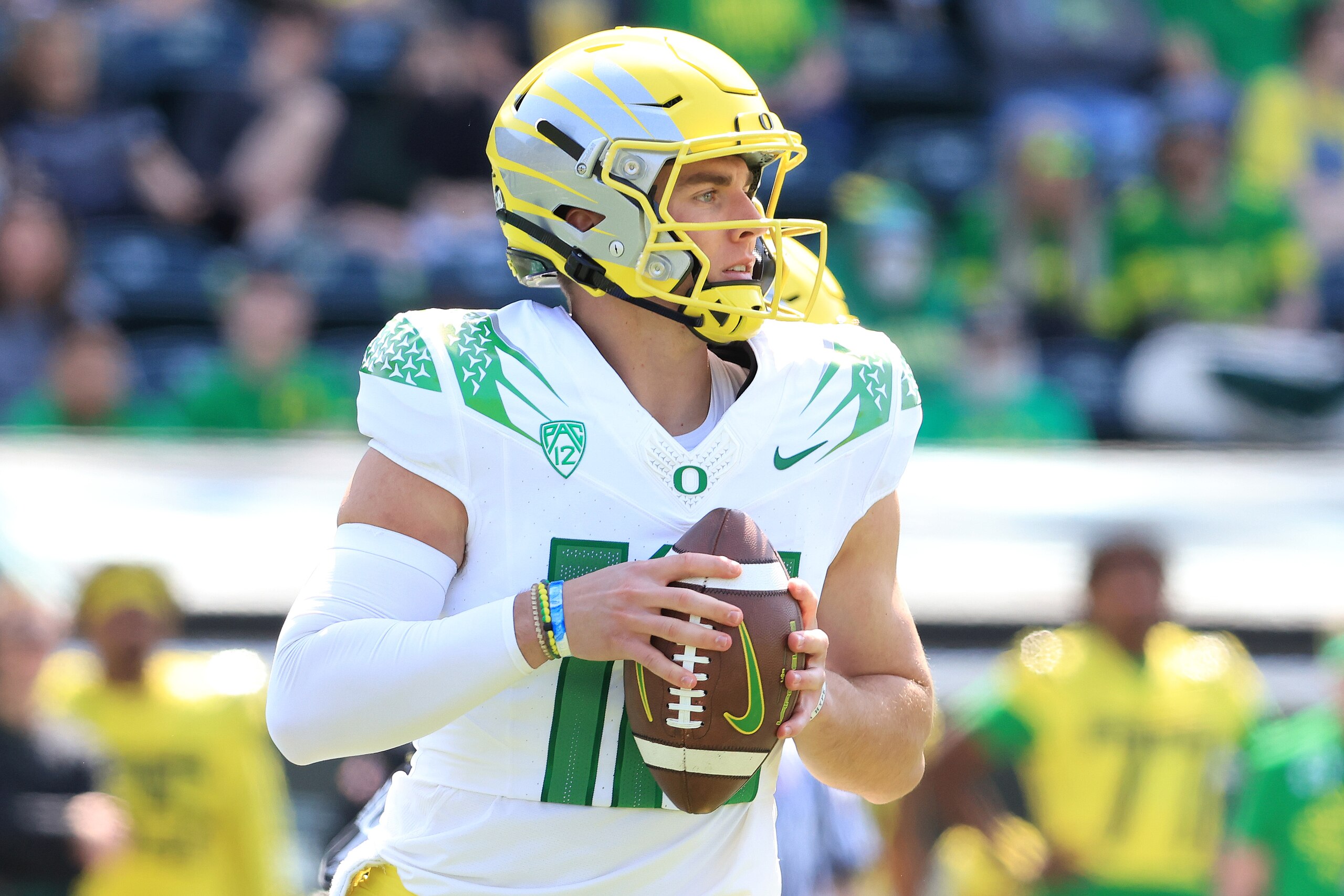 EUGENE, OREGON - APRIL 23: Bo Nix #10 of Team Yellow looks to pass the ball against Team Green during the third quarter of the Oregon Spring Game at Autzen Stadium on April 23, 2022 in Eugene, Oregon. (Photo by Abbie Parr/Getty Images)