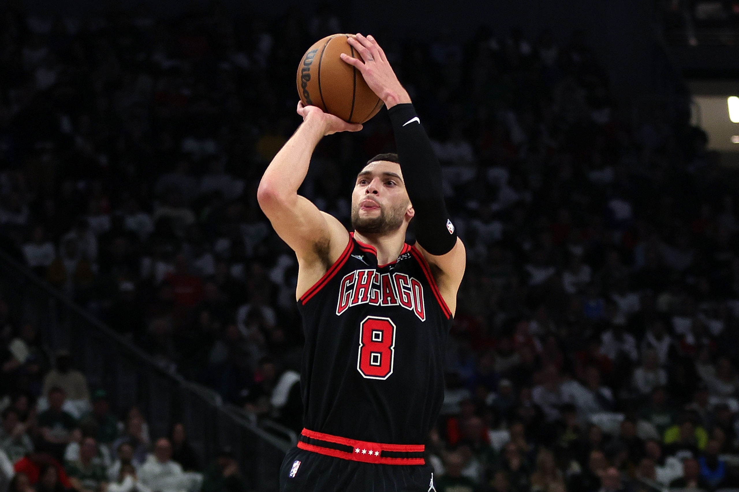 MILWAUKEE, WISCONSIN - APRIL 20: Zach LaVine #8 of the Chicago Bulls takes a three point shot in the second quarter against the Milwaukee Bucks during Game Two of the Eastern Conference First Round Playoffs at Fiserv Forum on April 20, 2022 in Milwaukee, Wisconsin. NOTE TO USER: User expressly acknowledges and agrees that, by downloading and or using this photograph, User is consenting to the terms and conditions of the Getty Images License Agreement. (Photo by Stacy Revere/Getty Images) MILWAUKEE, WISCONSIN - APRIL 20: Zach LaVine #8 of the Chicago Bulls takes a three point shot in the second quarter against the Milwaukee Bucks during Game Two of the Eastern Conference First Round Playoffs at Fiserv Forum on April 20, 2022 in Milwaukee, Wisconsin. NOTE TO USER: User expressly acknowledges and agrees that, by downloading and or using this photograph, User is consenting to the terms and conditions of the Getty Images License Agreement. (Photo by Stacy Revere/Getty Images)