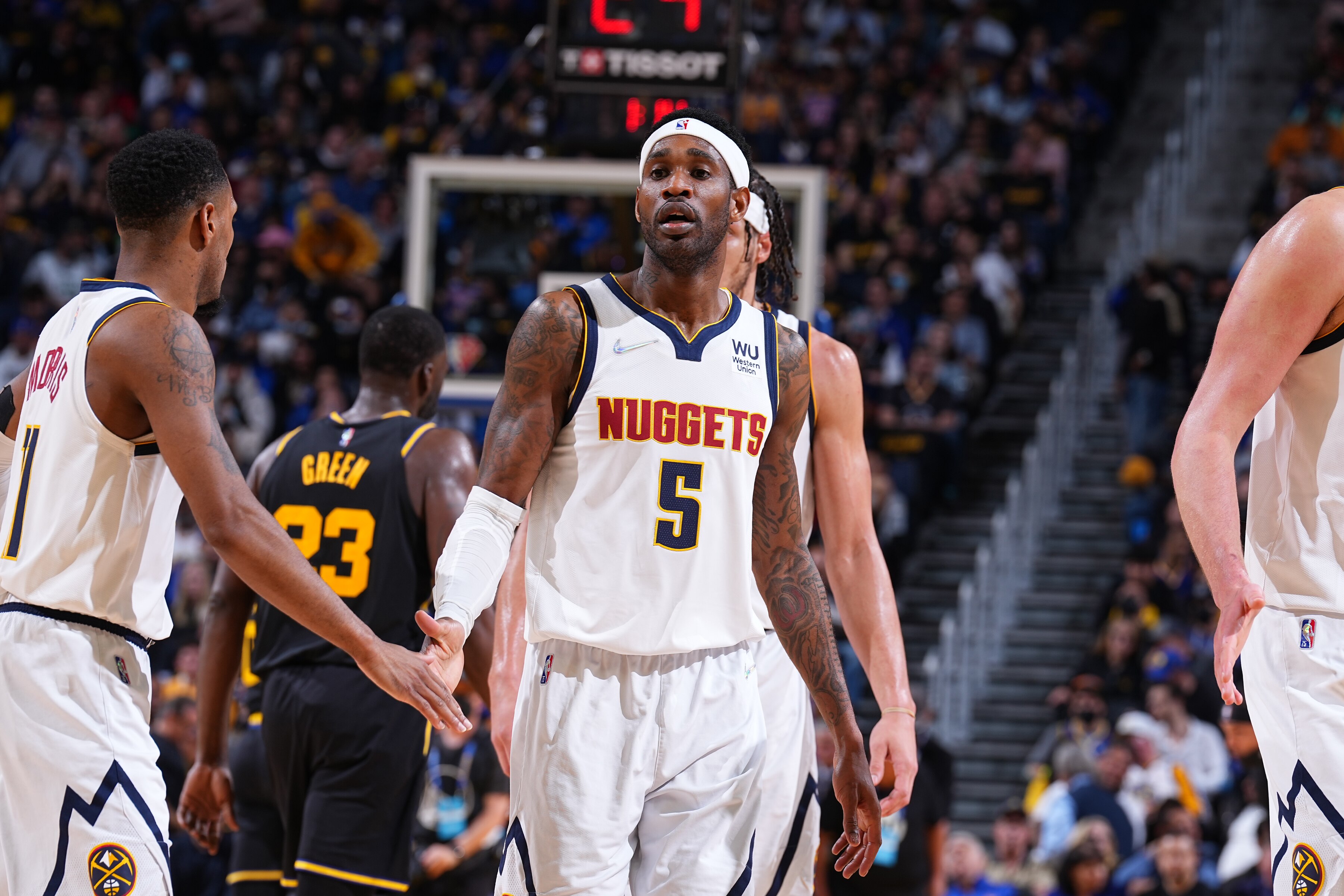 SAN FRANCISCO, CA - APRIL 27: Will Barton #5 of the Denver Nuggets high fives Monte Morris #11 of the Denver Nuggets during Round 1 Game 5 of the 2022 NBA Playoffs on April 27, 2022 at Chase Center in San Francisco, California. NOTE TO USER: User expressly acknowledges and agrees that, by downloading and or using this photograph, user is consenting to the terms and conditions of Getty Images License Agreement. Mandatory Copyright Notice: Copyright 2022 NBAE (Photo by Garrett Ellwood/NBAE via Getty Images)