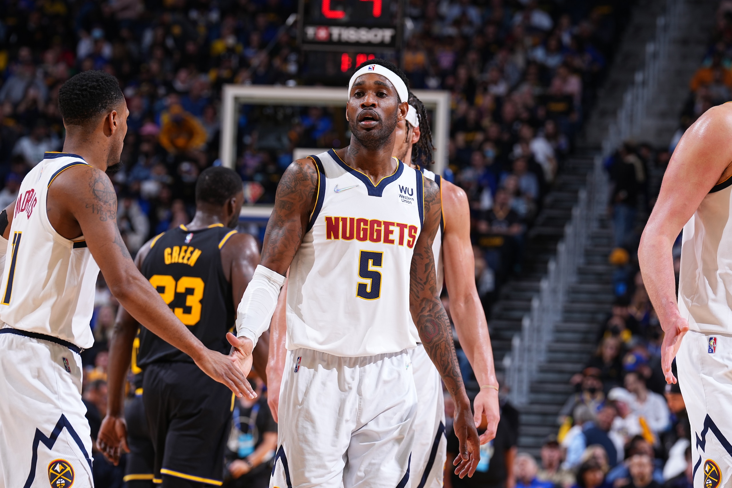 SAN FRANCISCO, CA - APRIL 27: Will Barton #5 of the Denver Nuggets high fives Monte Morris #11 of the Denver Nuggets during Round 1 Game 5 of the 2022 NBA Playoffs on April 27, 2022 at Chase Center in San Francisco, California. NOTE TO USER: User expressly acknowledges and agrees that, by downloading and or using this photograph, user is consenting to the terms and conditions of Getty Images License Agreement. Mandatory Copyright Notice: Copyright 2022 NBAE (Photo by Garrett Ellwood/NBAE via Getty Images) SAN FRANCISCO, CA - APRIL 27: Will Barton #5 of the Denver Nuggets high fives Monte Morris #11 of the Denver Nuggets during Round 1 Game 5 of the 2022 NBA Playoffs on April 27, 2022 at Chase Center in San Francisco, California. NOTE TO USER: User expressly acknowledges and agrees that, by downloading and or using this photograph, user is consenting to the terms and conditions of Getty Images License Agreement. Mandatory Copyright Notice: Copyright 2022 NBAE (Photo by Garrett Ellwood/NBAE via Getty Images)