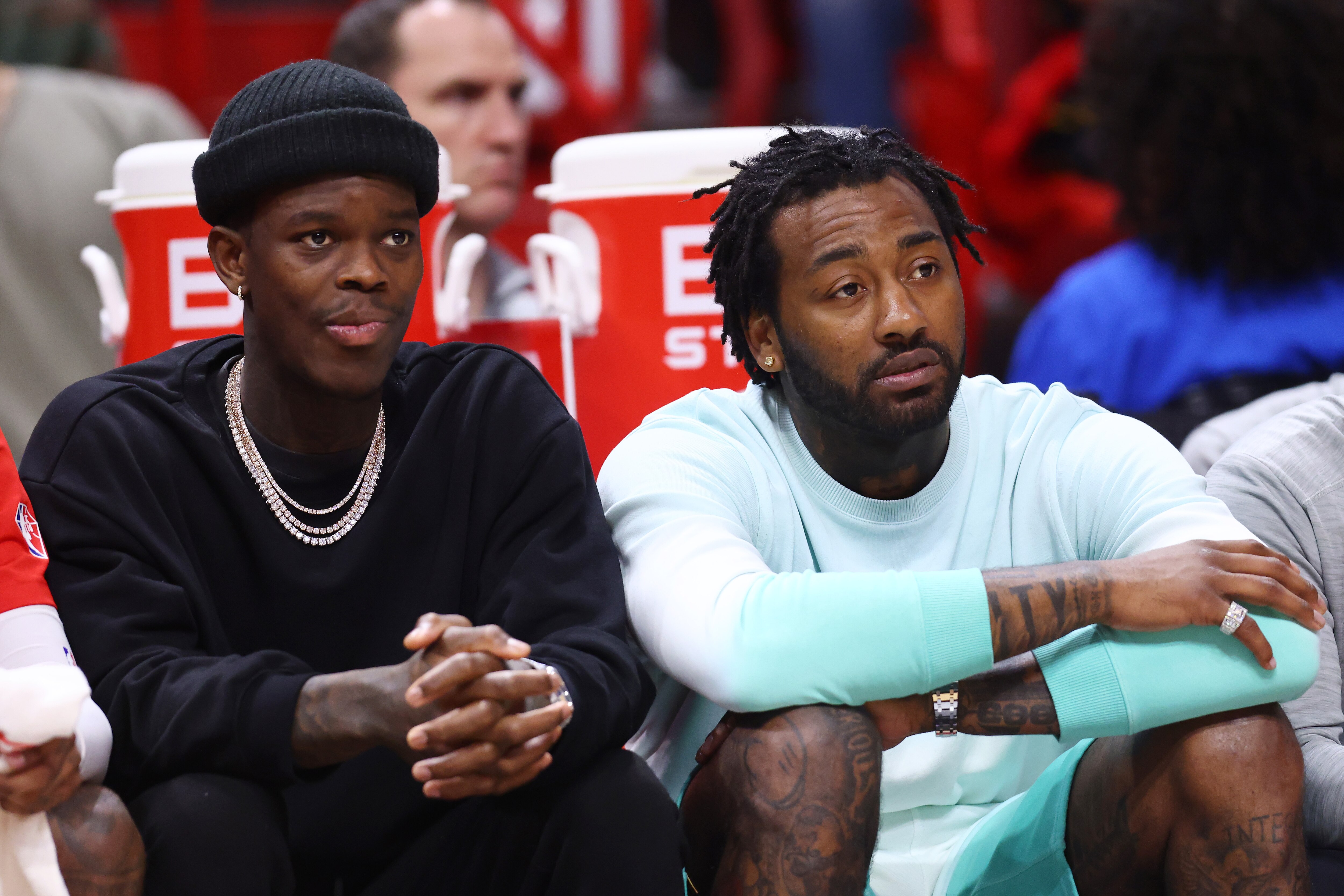 MIAMI, FLORIDA - MARCH 07: Dennis Schroder #17 and John Wall #1 of the Houston Rockets look on against the Miami Heat during the first half at FTX Arena on March 07, 2022 in Miami, Florida. NOTE TO USER: User expressly acknowledges and agrees that, by downloading and or using this photograph, User is consenting to the terms and conditions of the Getty Images License Agreement. (Photo by Michael Reaves/Getty Images)
