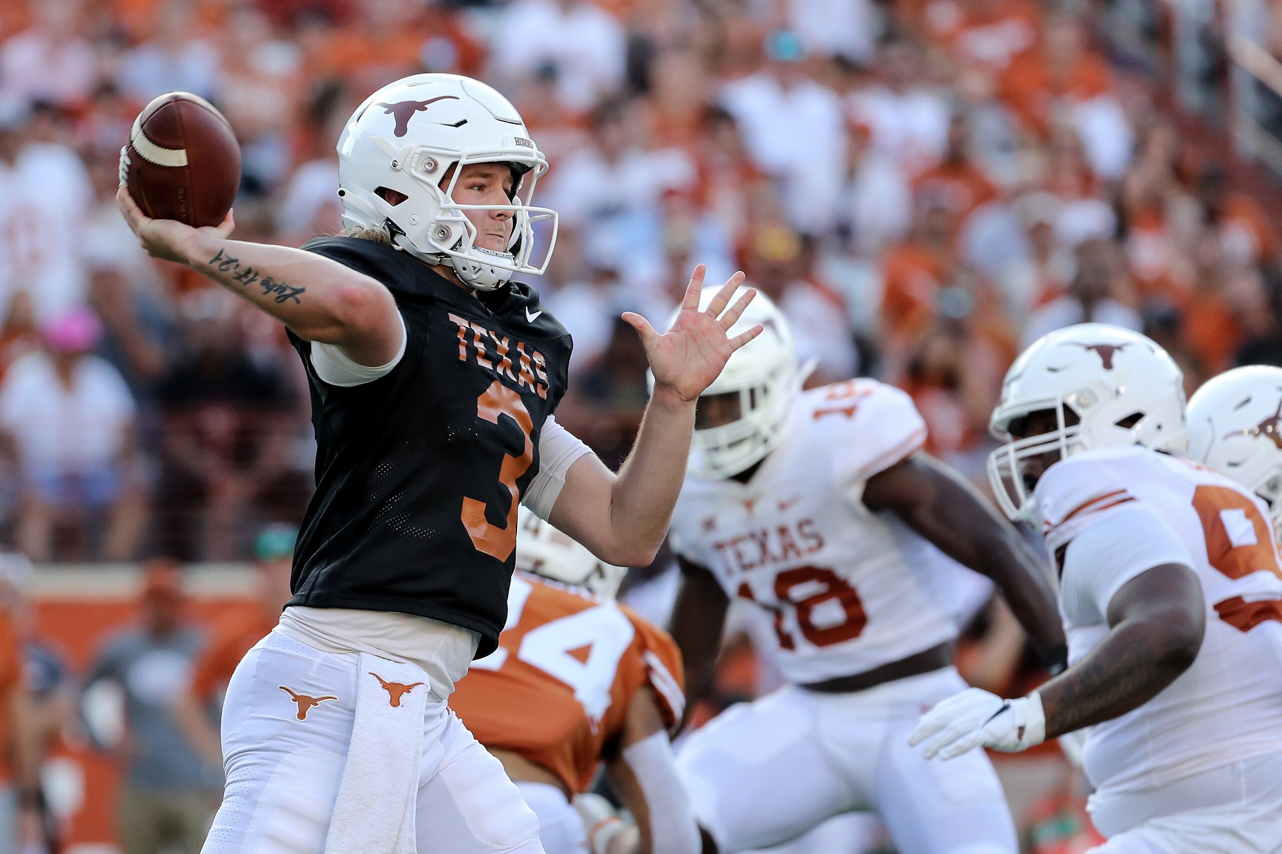AUSTIN, TEXAS - APRIL 23: Quinn Ewers #3 of Texas Longhorns throws a pass during the Orange-White Spring Game at Darrell K Royal-Texas Memorial Stadium on April 23, 2022 in Austin, Texas. (Photo by Tim Warner/Getty Images)
