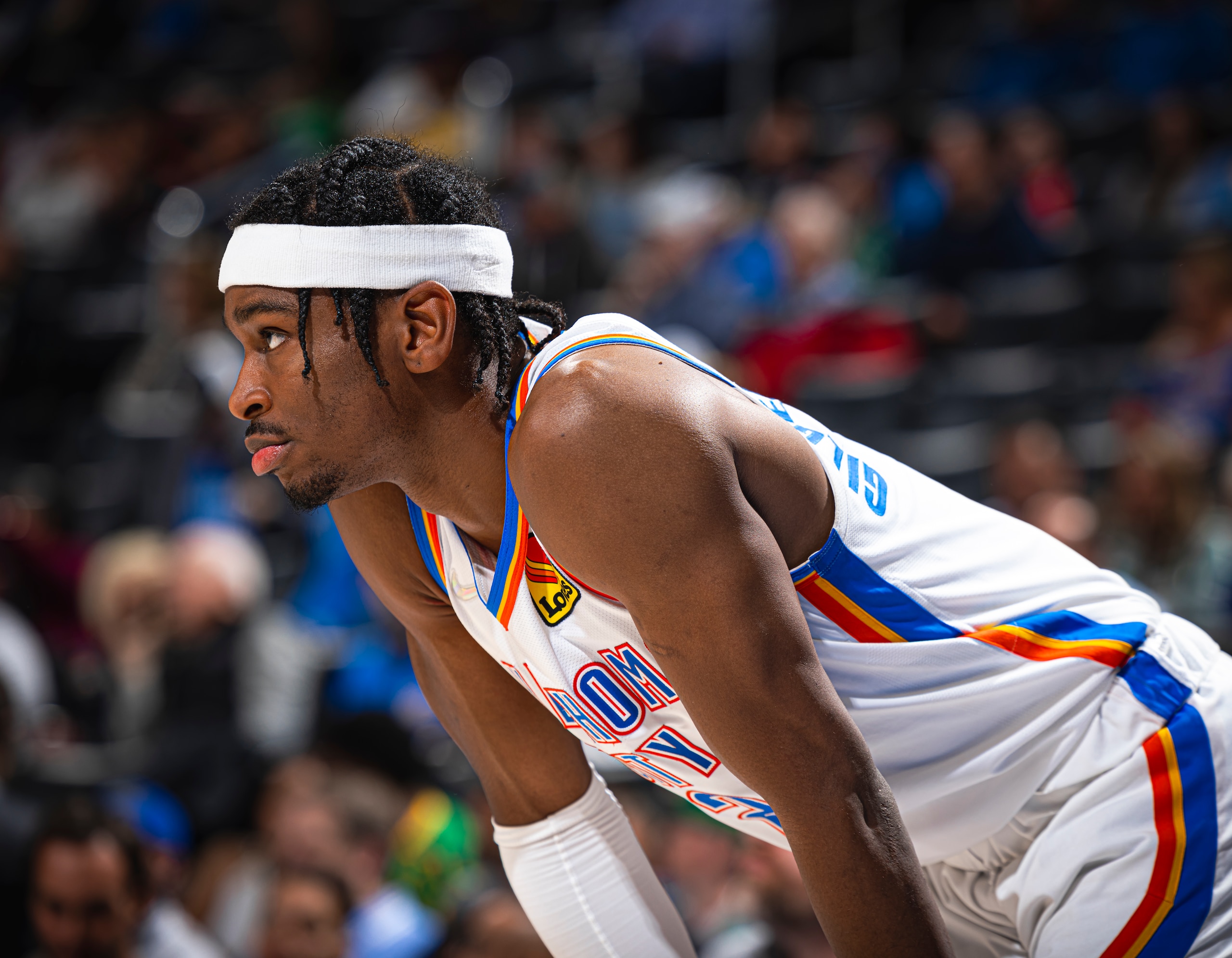 OKLAHOMA CITY, OK - MARCH 21: Shai Gilgeous-Alexander #2 of the Oklahoma City Thunder looks on during the game against the Boston Celtics on March 21, 2022 at Paycom Arena in Oklahoma City, Oklahoma. NOTE TO USER: User expressly acknowledges and agrees that, by downloading and or using this photograph, User is consenting to the terms and conditions of the Getty Images License Agreement. Mandatory Copyright Notice: Copyright 2022 NBAE (Photo by Zach Beeker/NBAE via Getty Images) OKLAHOMA CITY, OK - MARCH 21: Shai Gilgeous-Alexander #2 of the Oklahoma City Thunder looks on during the game against the Boston Celtics on March 21, 2022 at Paycom Arena in Oklahoma City, Oklahoma. NOTE TO USER: User expressly acknowledges and agrees that, by downloading and or using this photograph, User is consenting to the terms and conditions of the Getty Images License Agreement. Mandatory Copyright Notice: Copyright 2022 NBAE (Photo by Zach Beeker/NBAE via Getty Images)