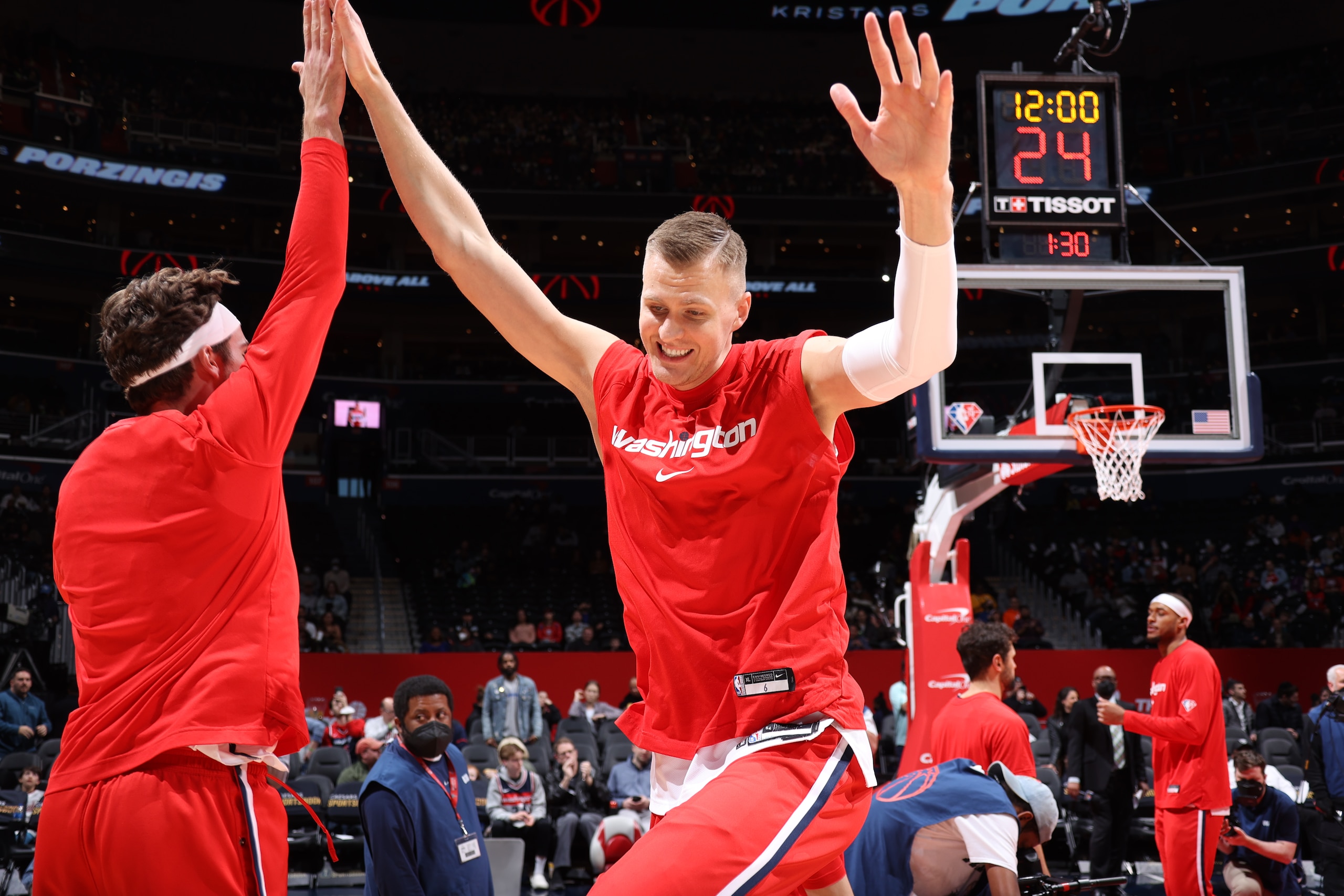 WASHINGTON, DC -ย MARCH 30: Kristaps Porzingis #6 of the Washington Wizards high fives Corey Kispert #24 of the Washington Wizards prior to the game against the Orlando Magic on March 30, 2022 at Capital One Arena in Washington, DC. NOTE TO USER: User expressly acknowledges and agrees that, by downloading and or using this Photograph, user is consenting to the terms and conditions of the Getty Images License Agreement. Mandatory Copyright Notice: Copyright 2022 NBAE (Photo by Stephen Gosling/NBAE via Getty Images) WASHINGTON, DC -ย MARCH 30: Kristaps Porzingis #6 of the Washington Wizards high fives Corey Kispert #24 of the Washington Wizards prior to the game against the Orlando Magic on March 30, 2022 at Capital One Arena in Washington, DC. NOTE TO USER: User expressly acknowledges and agrees that, by downloading and or using this Photograph, user is consenting to the terms and conditions of the Getty Images License Agreement. Mandatory Copyright Notice: Copyright 2022 NBAE (Photo by Stephen Gosling/NBAE via Getty Images)