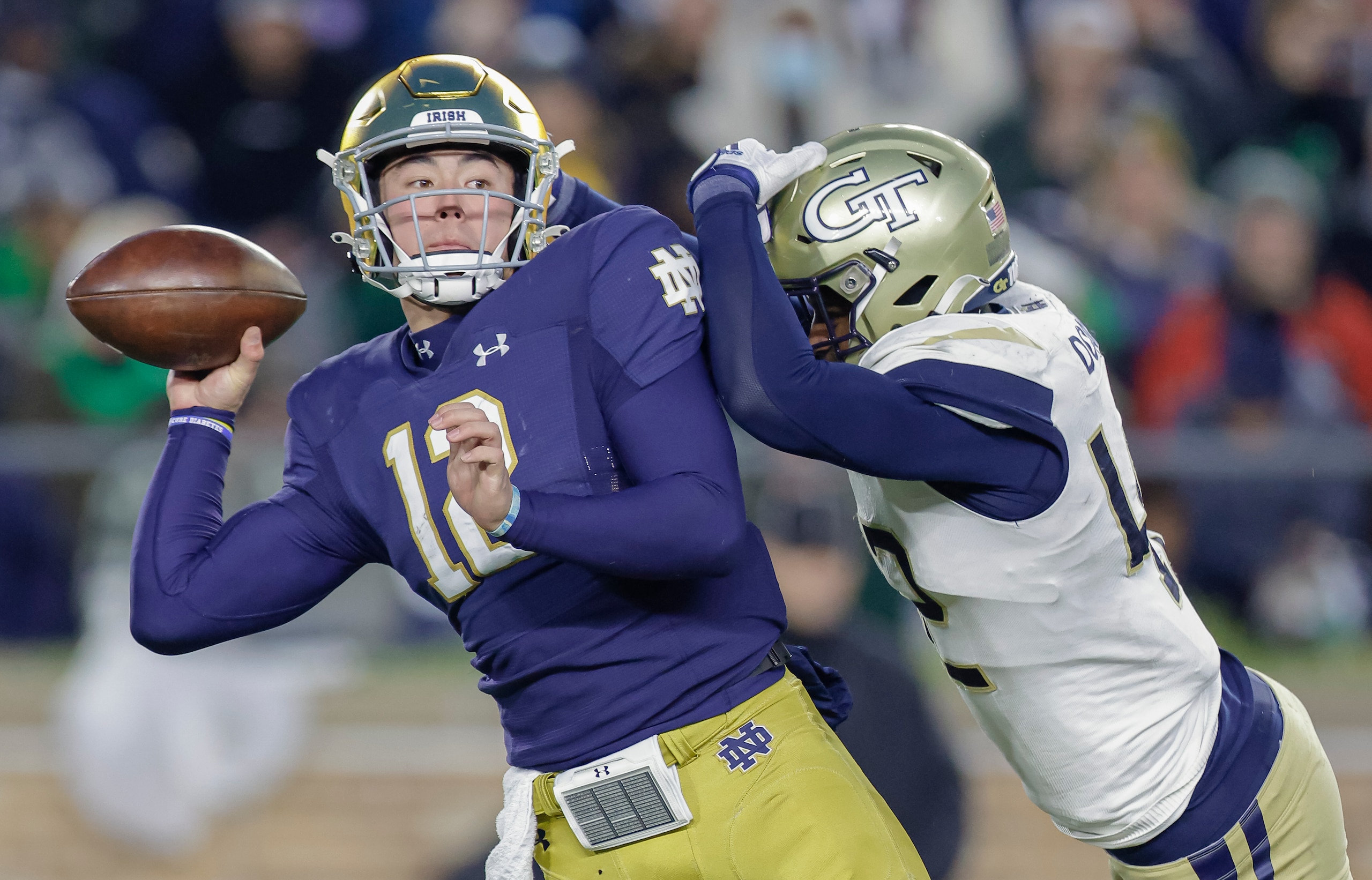 SOUTH BEND, IN - NOVEMBER 20: Tyler Buchner #12 of the Notre Dame Fighting Irish throws the ball during the game against the Georgia Tech Yellow Jackets at Notre Dame Stadium on November 20, 2021 in South Bend, Indiana. (Photo by Michael Hickey/Getty Images)
