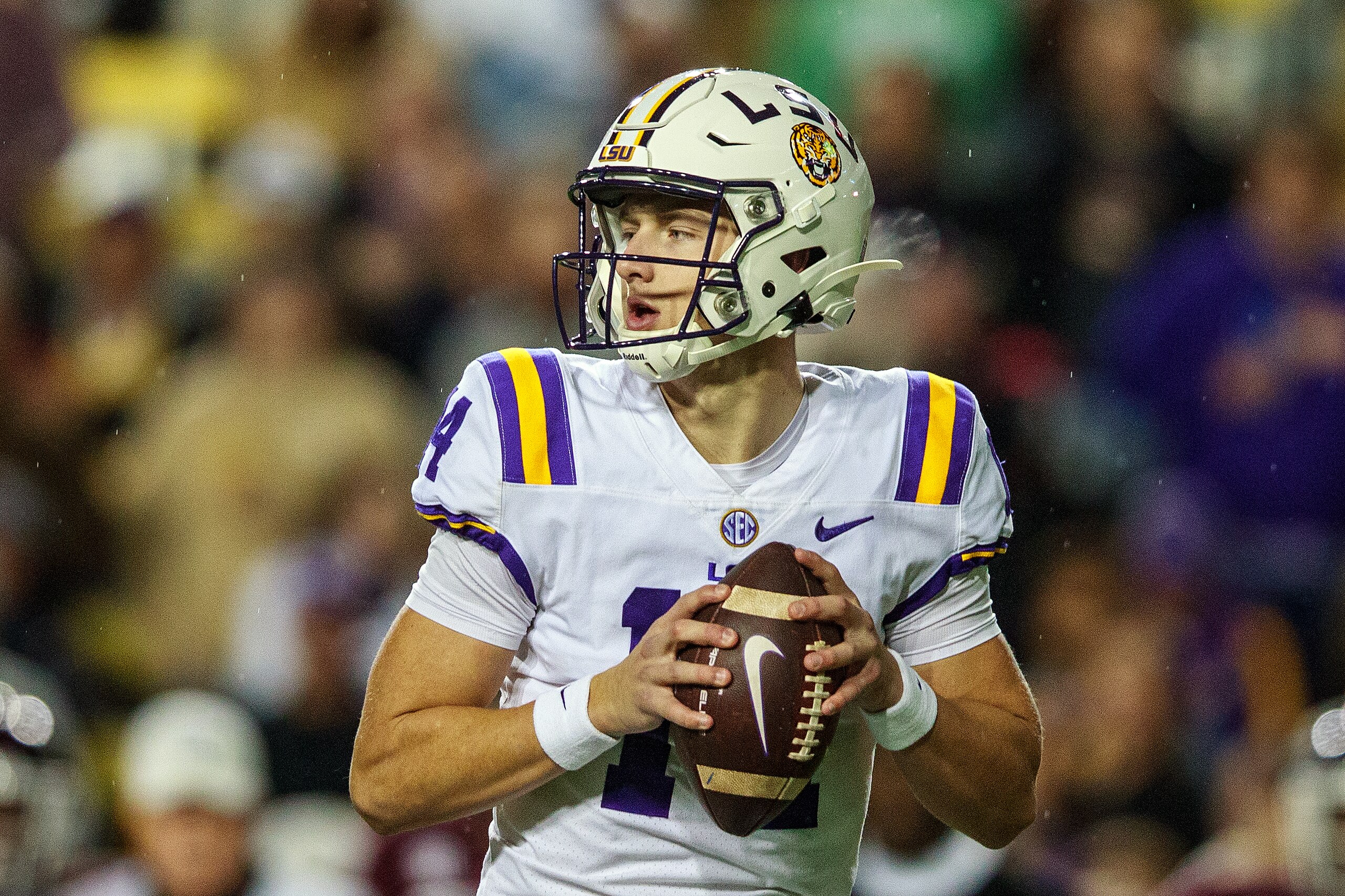 BATON ROUGE, LA - NOVEMBER 27: LSU Tigers Quarterback Max Johnson (14) throws a pass during a game between the Texas A&M Aggies and the LSU Tigers, in Tiger Stadium in Baton Rouge, Louisiana on November 27, 2021 (Photo by John Korduner/Icon Sportswire via Getty Images)