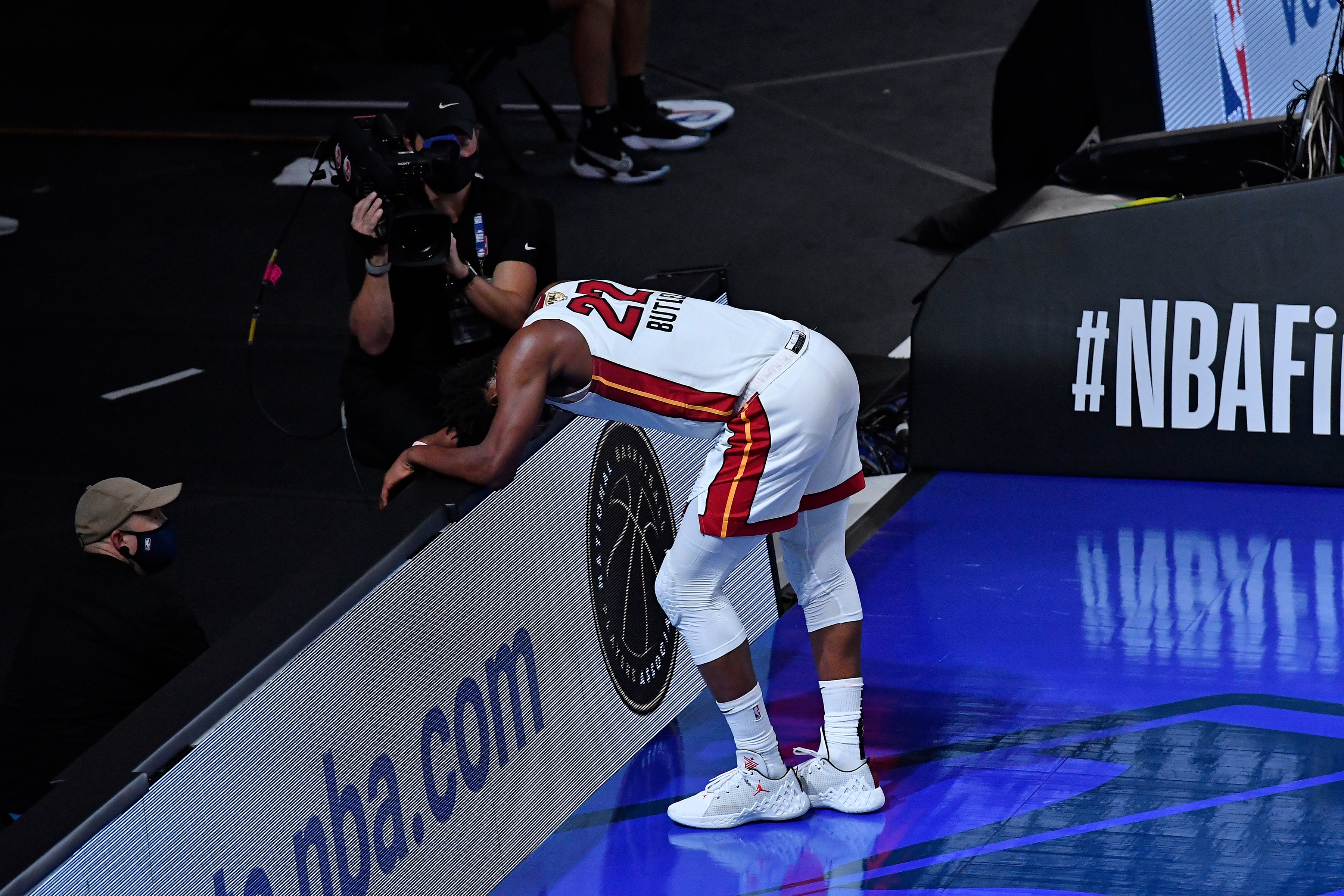 ORLANDO, FL - OCTOBER 9: Jimmy Butler #22 of the Miami Heat leans over to take a rest during Game Five of the NBA Finals on October 9, 2020 in Orlando, Florida at AdventHealth Arena. NOTE TO USER: User expressly acknowledges and agrees that, by downloading and/or using this Photograph, user is consenting to the terms and conditions of the Getty Images License Agreement. Mandatory Copyright Notice: Copyright 2020 NBAE (Photo by Fernando Medina/NBAE via Getty Images)