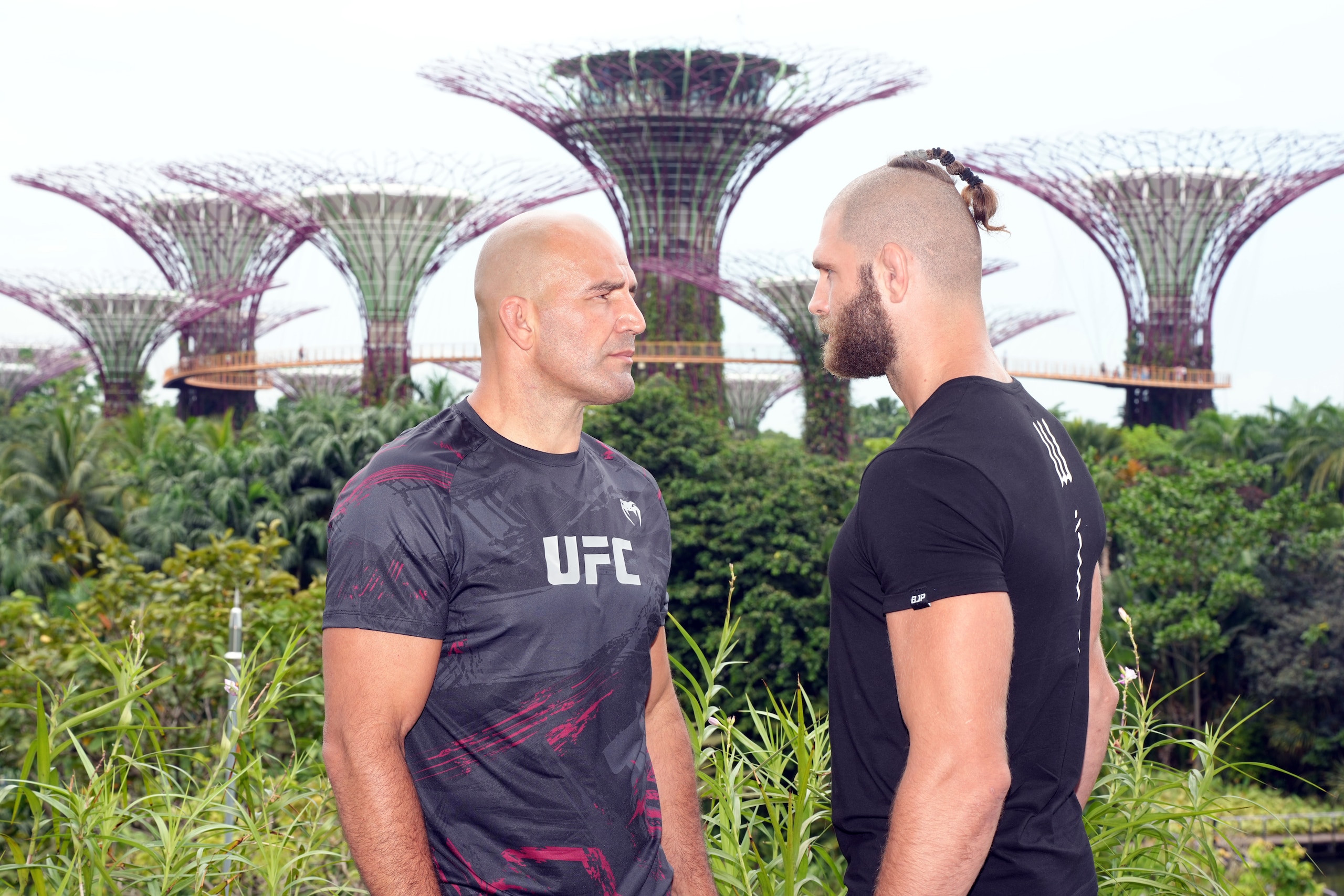 SINGAPORE, SINGAPORE - JUNE 07: (L-R) UFC light heavyweight champion Glover Texeira of Brazil and Jiri Prochazka of Czech Republic face off during a UFC photo session at Gardens by the Bay on June 7, 2022 in Singapore. (Photo by Jeff Bottari/Zuffa LLC)