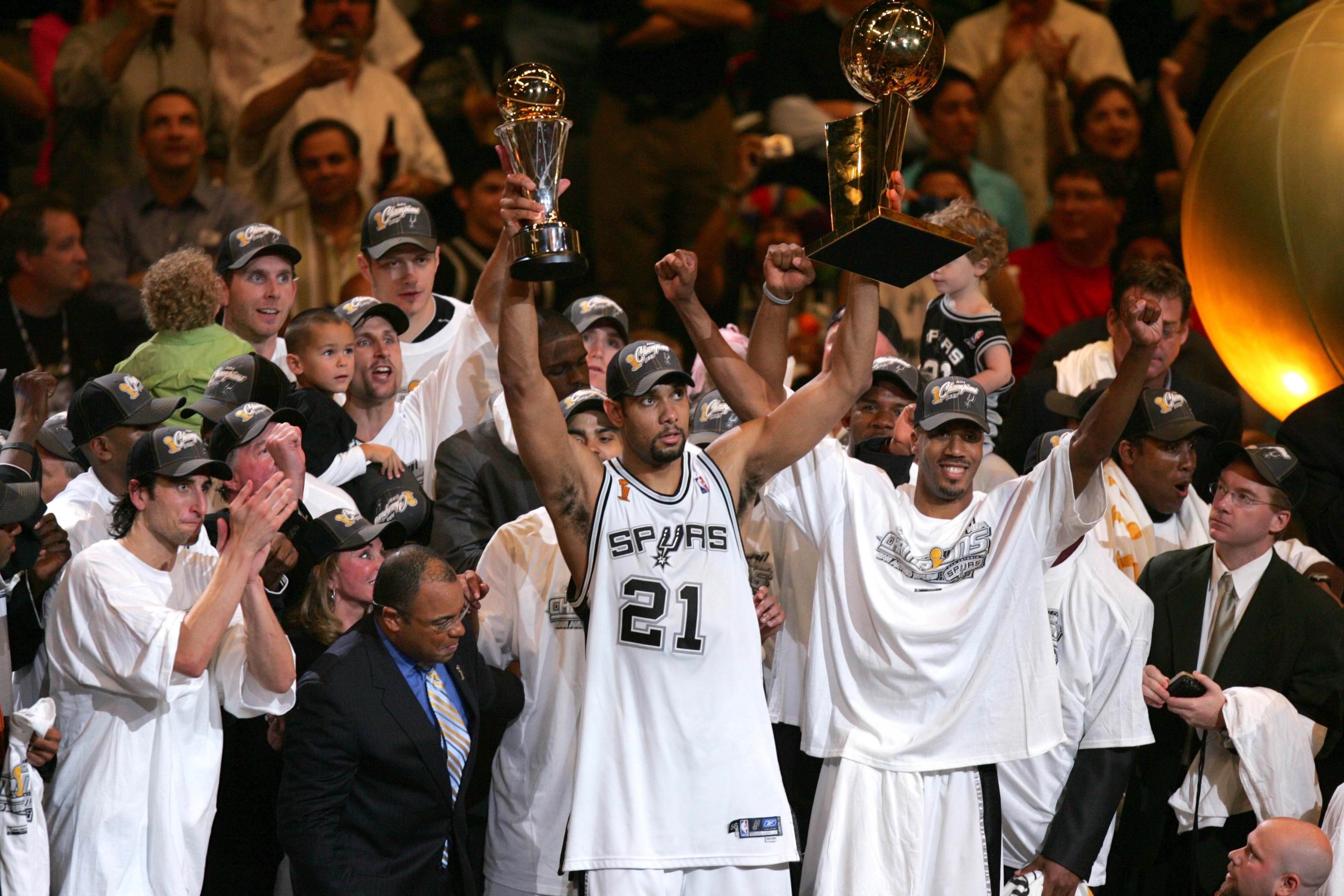 UNITED STATES - JUNE 23:  Basketball: NBA Finals, San Antonio Spurs Tim Duncan (21) victorious with MVP and Championship trophy after winning game vs Detroit Pistons, Game 7, San Antonio, TX 6/23/2005  (Photo by John W. McDonough/Sports Illustrated via Getty Images)  (SetNumber: X73797 TK1)