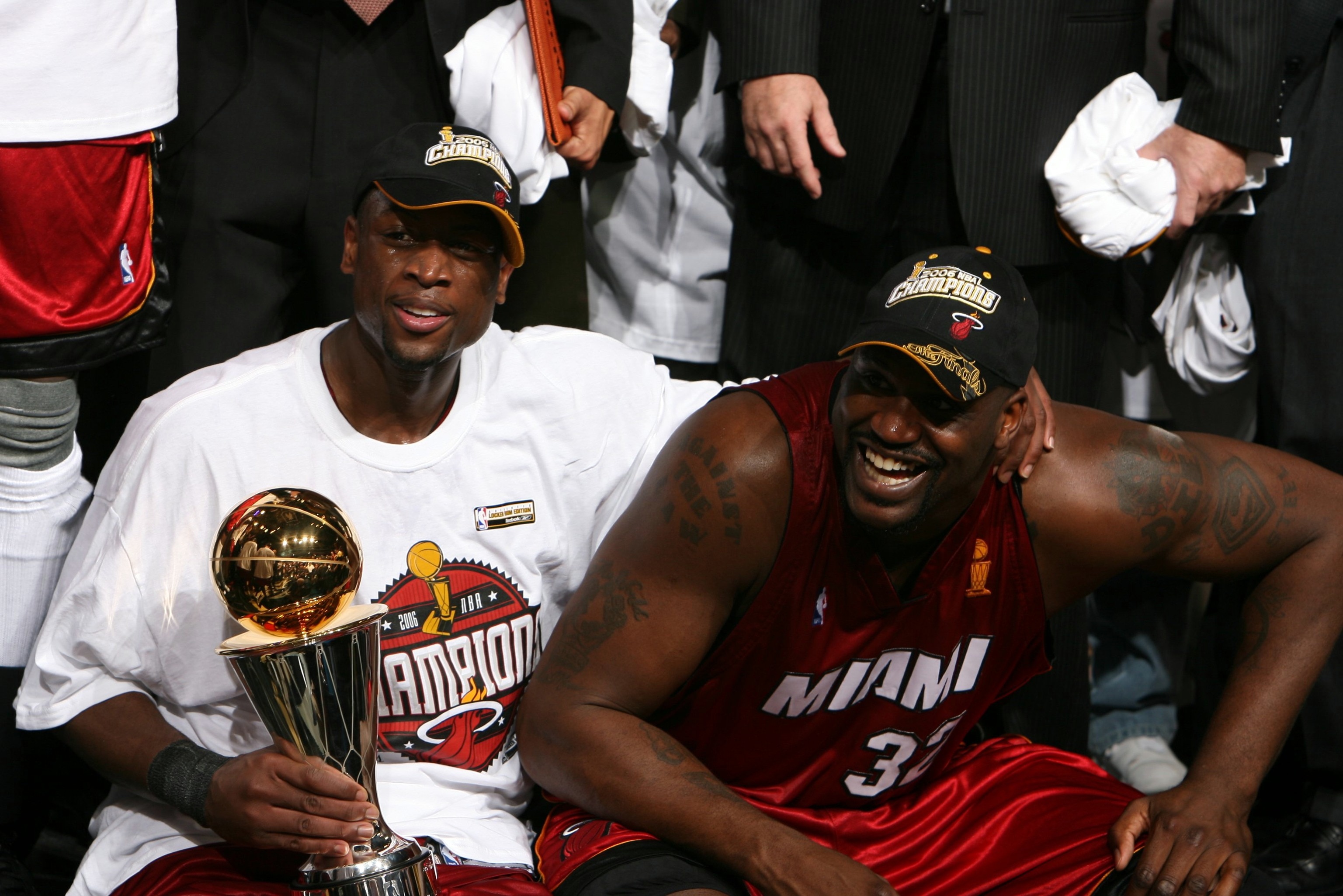 UNITED STATES - JUNE 20:  Basketball: NBA Finals, Closeup of Miami Heat Shaquille O'Neal (32) and Dwyane Wade (3) victorious with trophy after winning Game 6 and championship vs Dallas Mavericks, Dallas, TX 6/20/2006  (Photo by Bob Rosato/Sports Illustrated via Getty Images)  (SetNumber: X76204 TK1 R8)