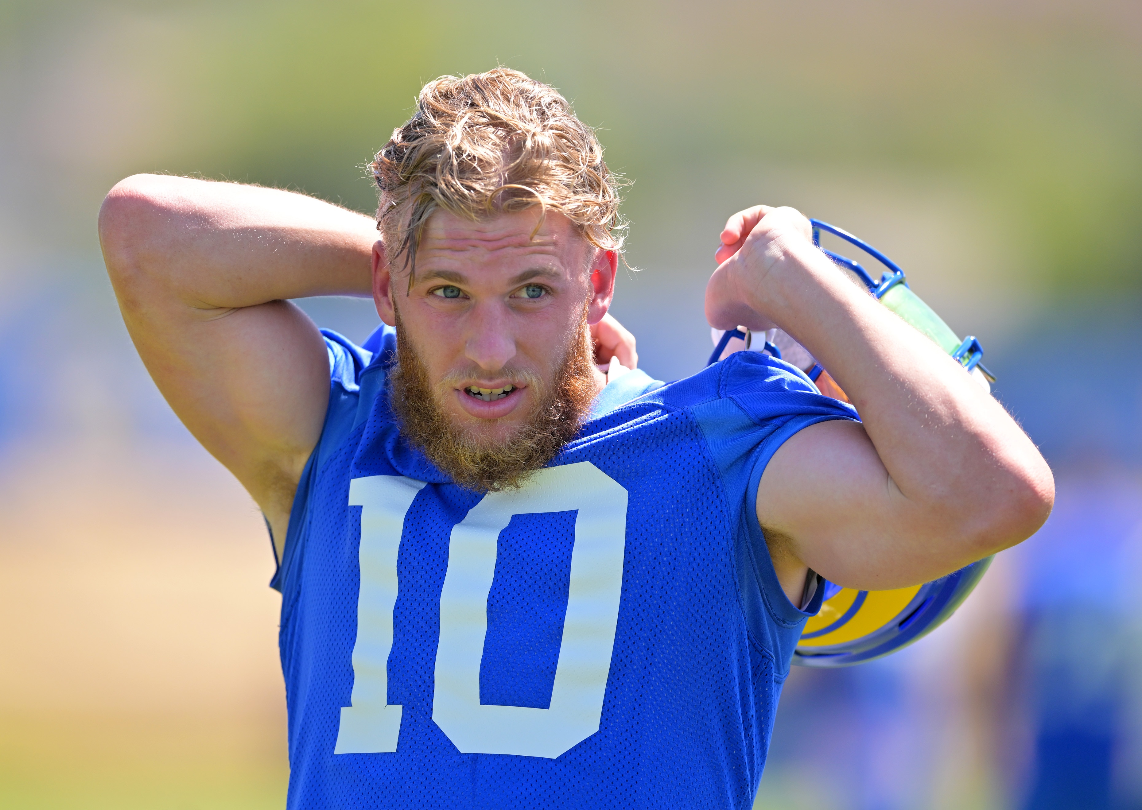 THOUSAND OAKS, CA - JUNE 7 : Cooper Kupp #10 of the Los Angeles Rams takes off his jersey following the first day mini camp at the team's facility at California Lutheran University on June 7, 2022  in Thousand Oaks, California. (Photo by Jayne Kamin-Oncea/Getty Images)
