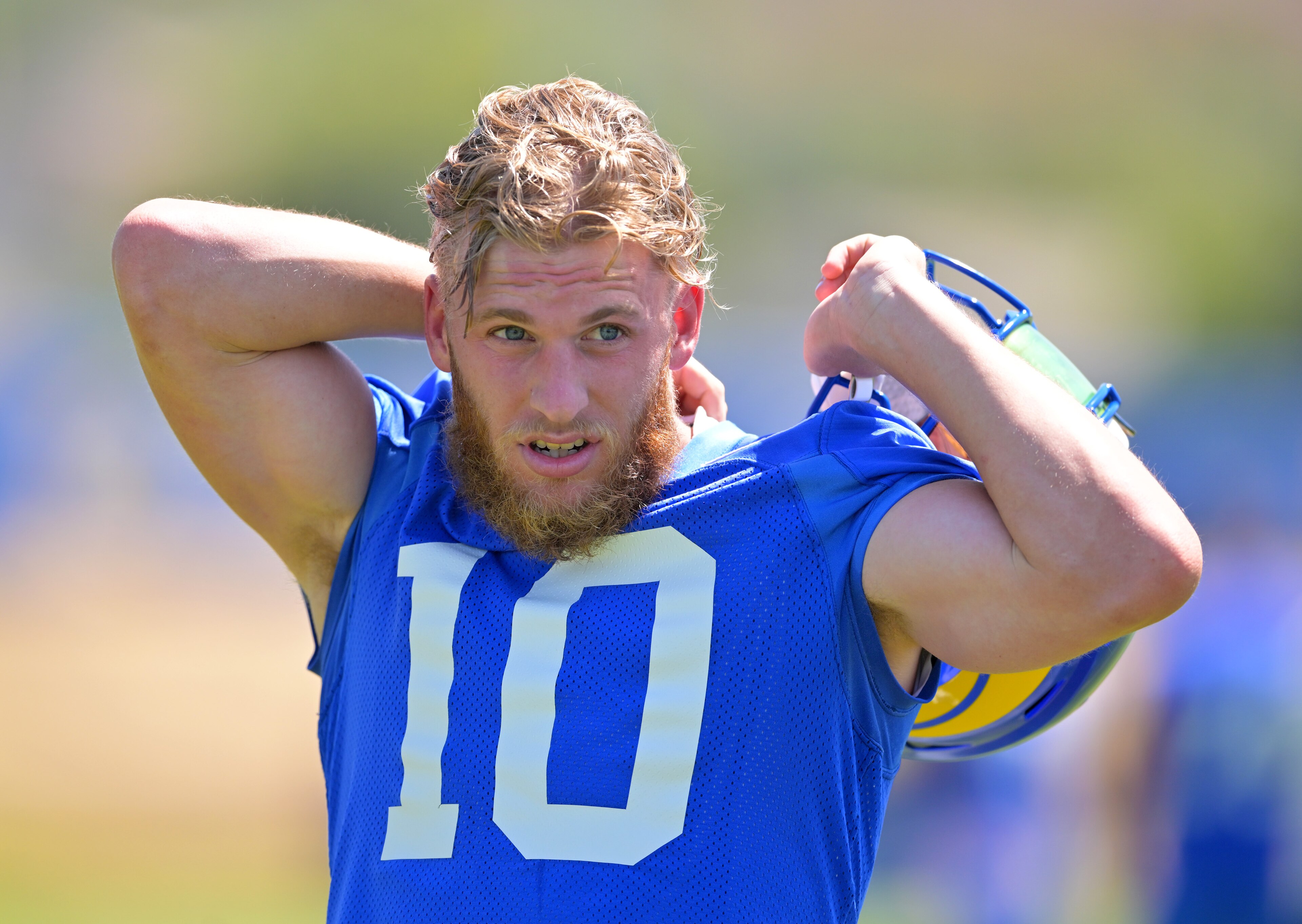 THOUSAND OAKS, CA - JUNE 7 : Cooper Kupp #10 of the Los Angeles Rams takes off his jersey following the first day mini camp at the team's facility at California Lutheran University on June 7, 2022  in Thousand Oaks, California. (Photo by Jayne Kamin-Oncea/Getty Images)