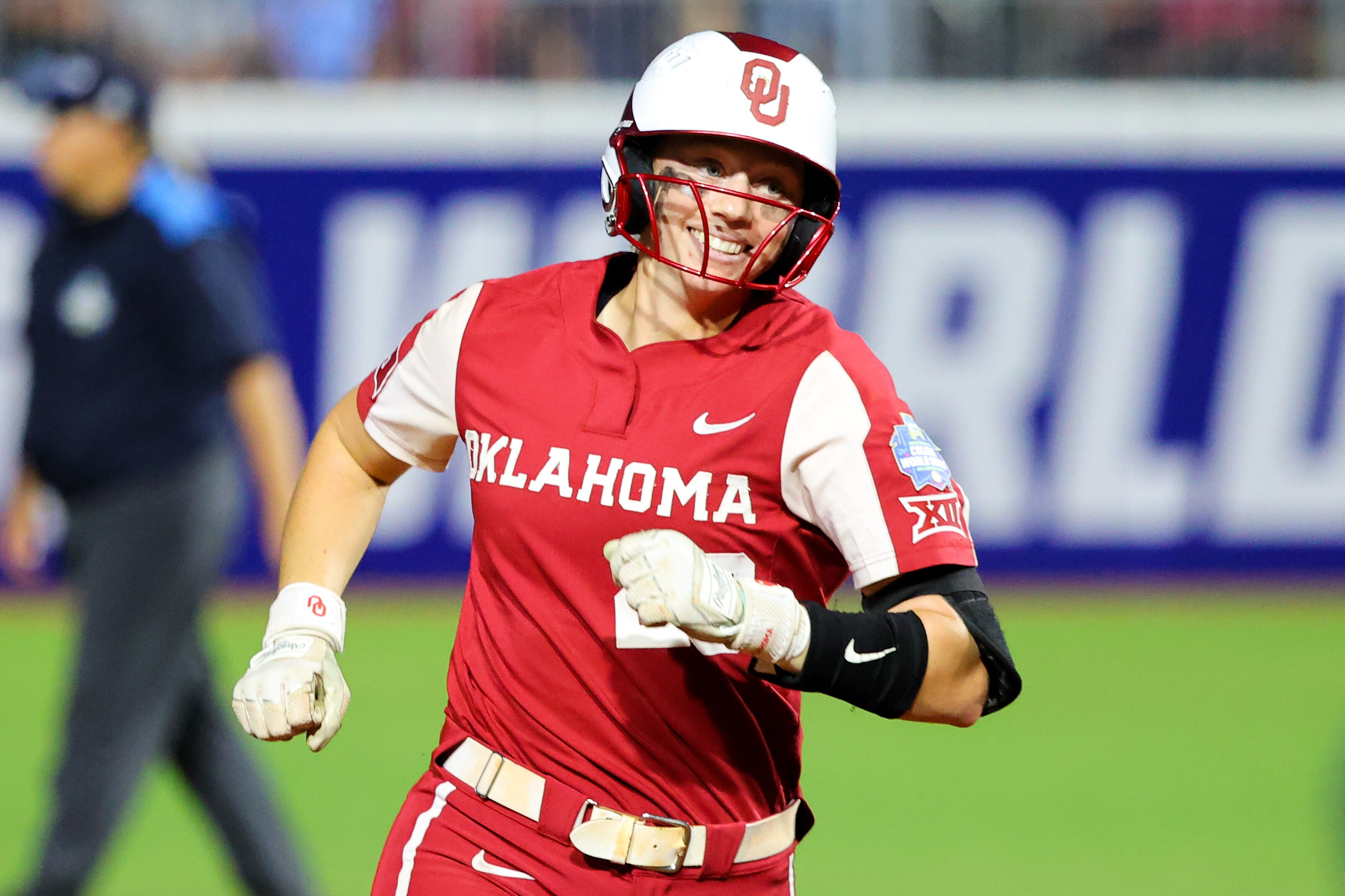 OKLAHOMA CITY, OK - JUNE 08: Jana Johns #20 of the Oklahoma Sooners rounds the bases after hitting a home during the third inning against the Texas Longhorns during the Division I Womens Softball Championship held at ASA Hall of Fame Stadium on June 8, 2022 in Oklahoma City, Oklahoma. (Photo by C. Morgan Engel/NCAA Photos via Getty Images)