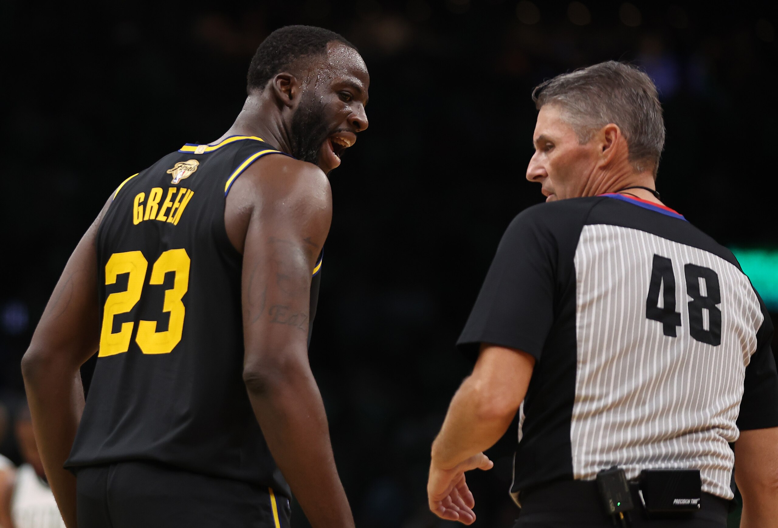 BOSTON, MASSACHUSETTS - JUNE 08: Draymond Green #23 of the Golden State Warriors argues with referee Scott Foster #48 in the second quarter during Game Three of the 2022 NBA Finals against the Boston Celtics at TD Garden on June 08, 2022 in Boston, Massachusetts. NOTE TO USER: User expressly acknowledges and agrees that, by downloading and/or using this photograph, User is consenting to the terms and conditions of the Getty Images License Agreement. (Photo by Maddie Meyer/Getty Images) BOSTON, MASSACHUSETTS - JUNE 08: Draymond Green #23 of the Golden State Warriors argues with referee Scott Foster #48 in the second quarter during Game Three of the 2022 NBA Finals against the Boston Celtics at TD Garden on June 08, 2022 in Boston, Massachusetts. NOTE TO USER: User expressly acknowledges and agrees that, by downloading and/or using this photograph, User is consenting to the terms and conditions of the Getty Images License Agreement. (Photo by Maddie Meyer/Getty Images)