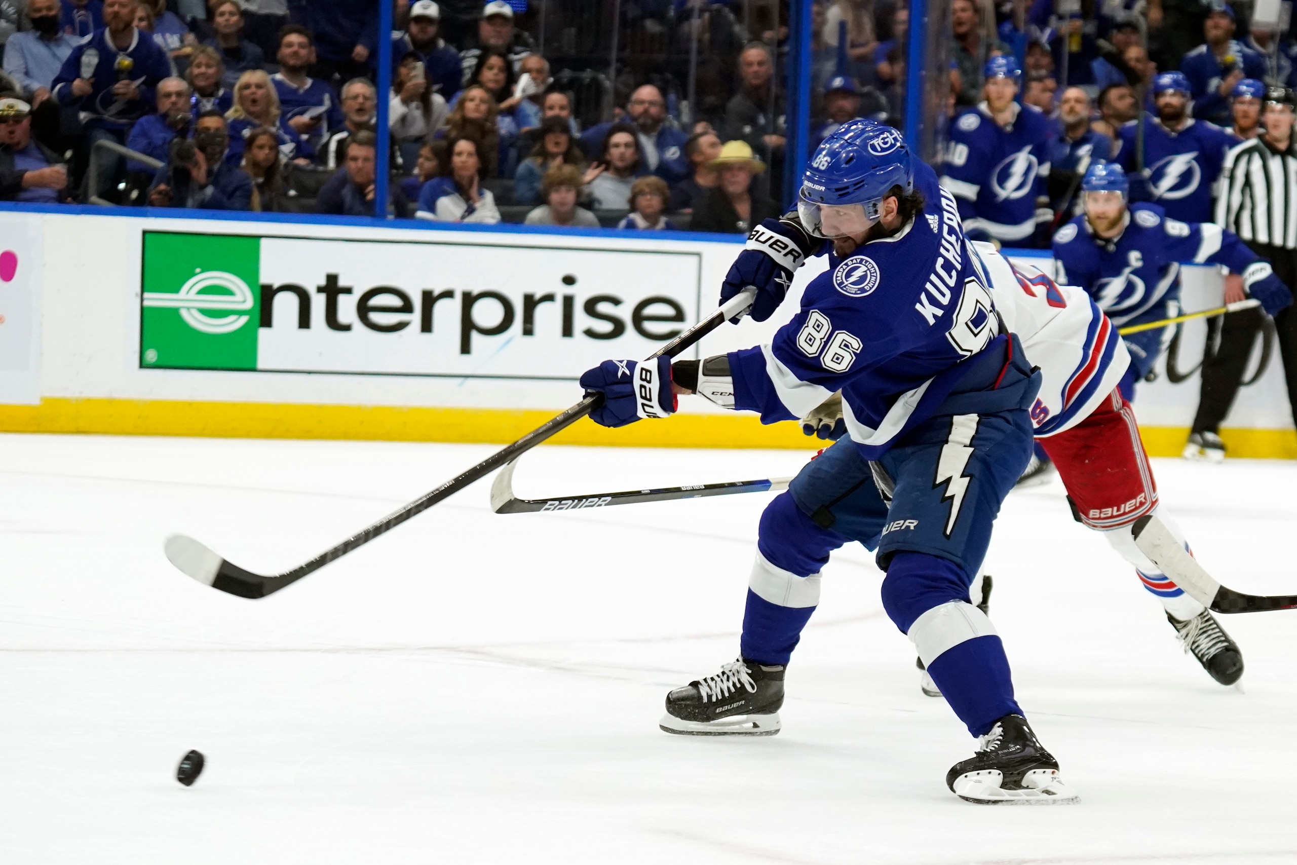 Tampa Bay Lightning right wing Nikita Kucherov (86) shoots a goal against the New York Rangers during the second period in Game 4 of the NHL Hockey Stanley Cup playoffs Eastern Conference finals Tuesday, June 7, 2022, in Tampa, Fla. (AP Photo/Chris O'Meara)