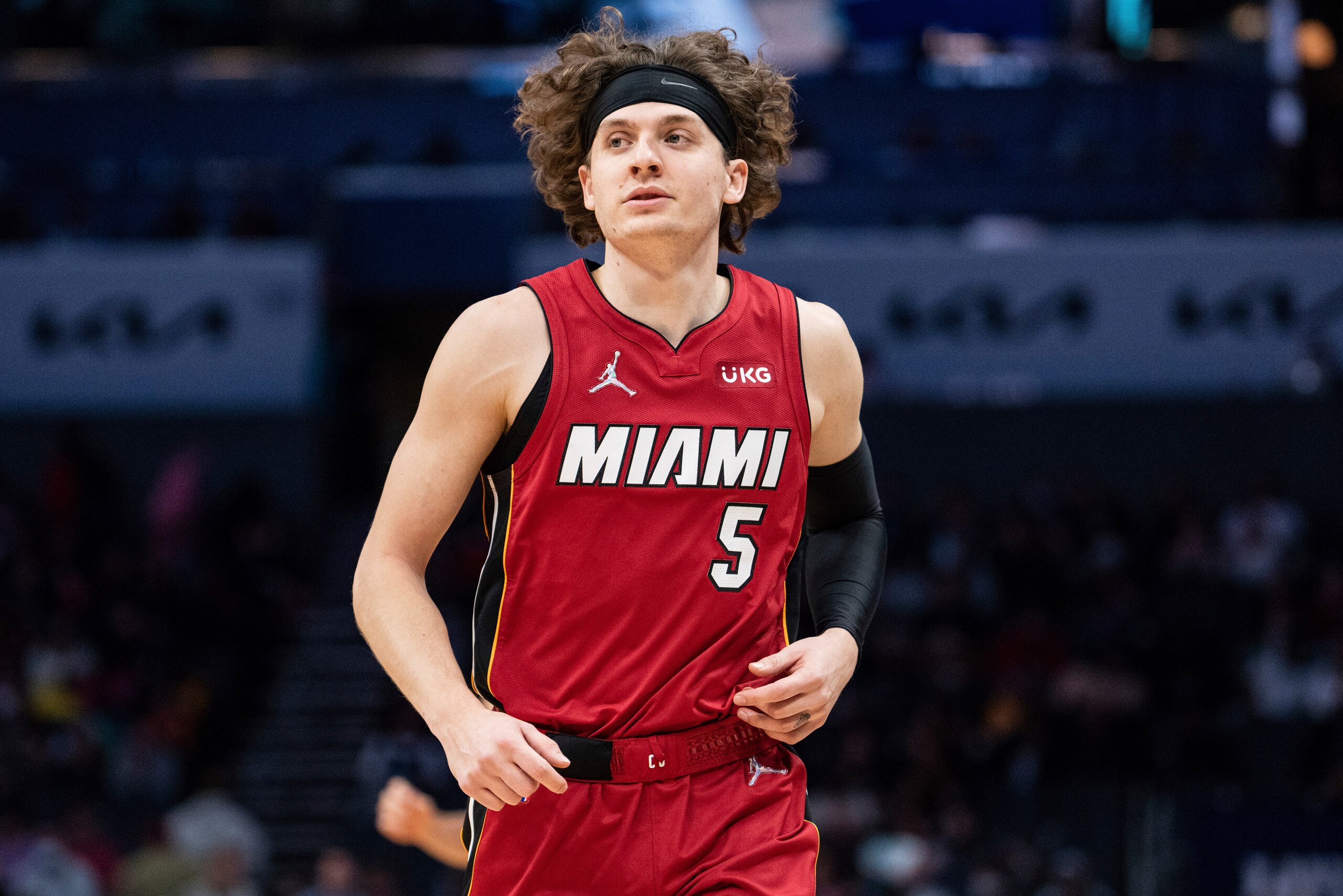 Miami Heat guard Kyle Guy (5) plays against the Charlotte Hornets during the second half of an NBA basketball game in Charlotte, N.C., Saturday, Feb. 5, 2022. (AP Photo/Jacob Kupferman)