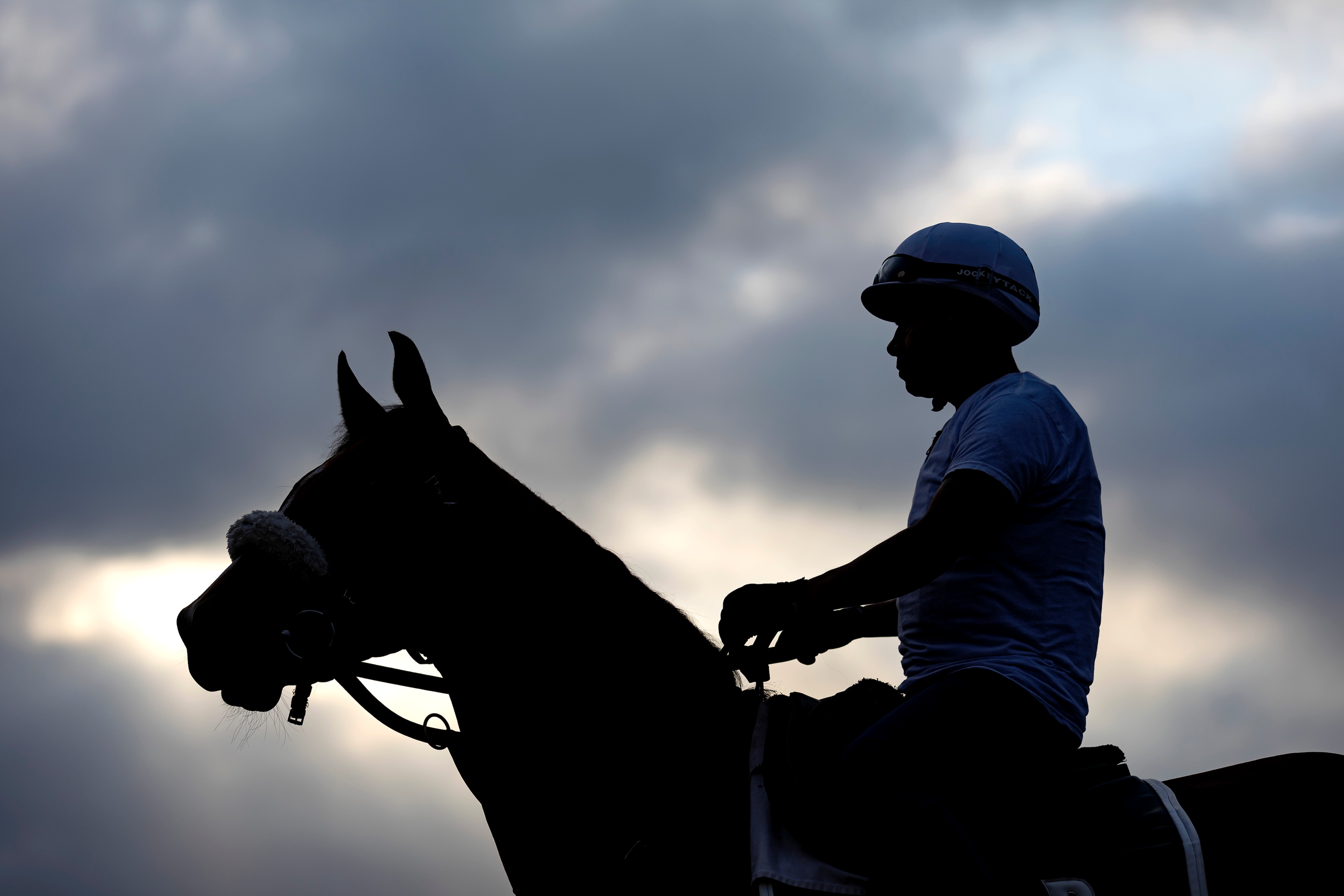 ELMONT, NEW YORK - JUNE 08:  An Exercise rider and horse look on during a morning workout prior to the 154th running of the Belmont Stakes at Belmont Park on June 08, 2022 in Elmont, New York. (Photo by Al Bello/Getty Images)