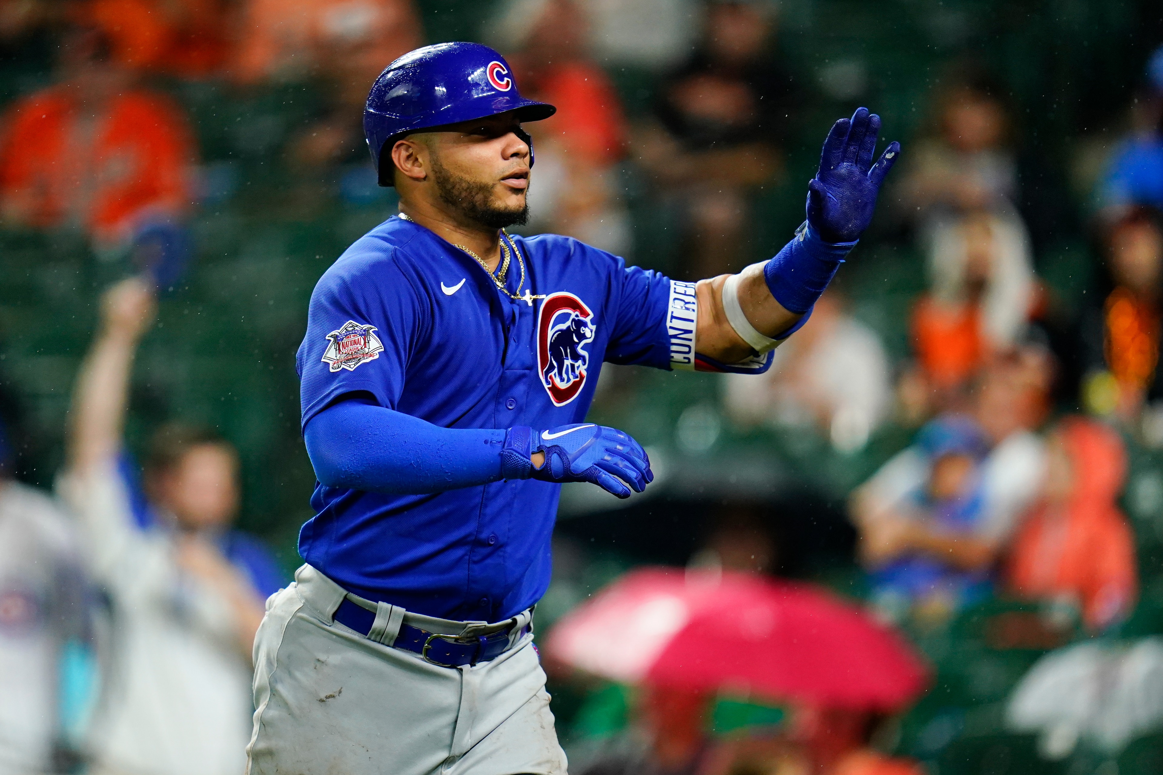 Chicago Cubs' Willson Contreras reacts after hitting a solo home run against the Baltimore Orioles during the fifth inning of a baseball game, Tuesday, June 7, 2022, in Baltimore. (AP Photo/Julio Cortez)