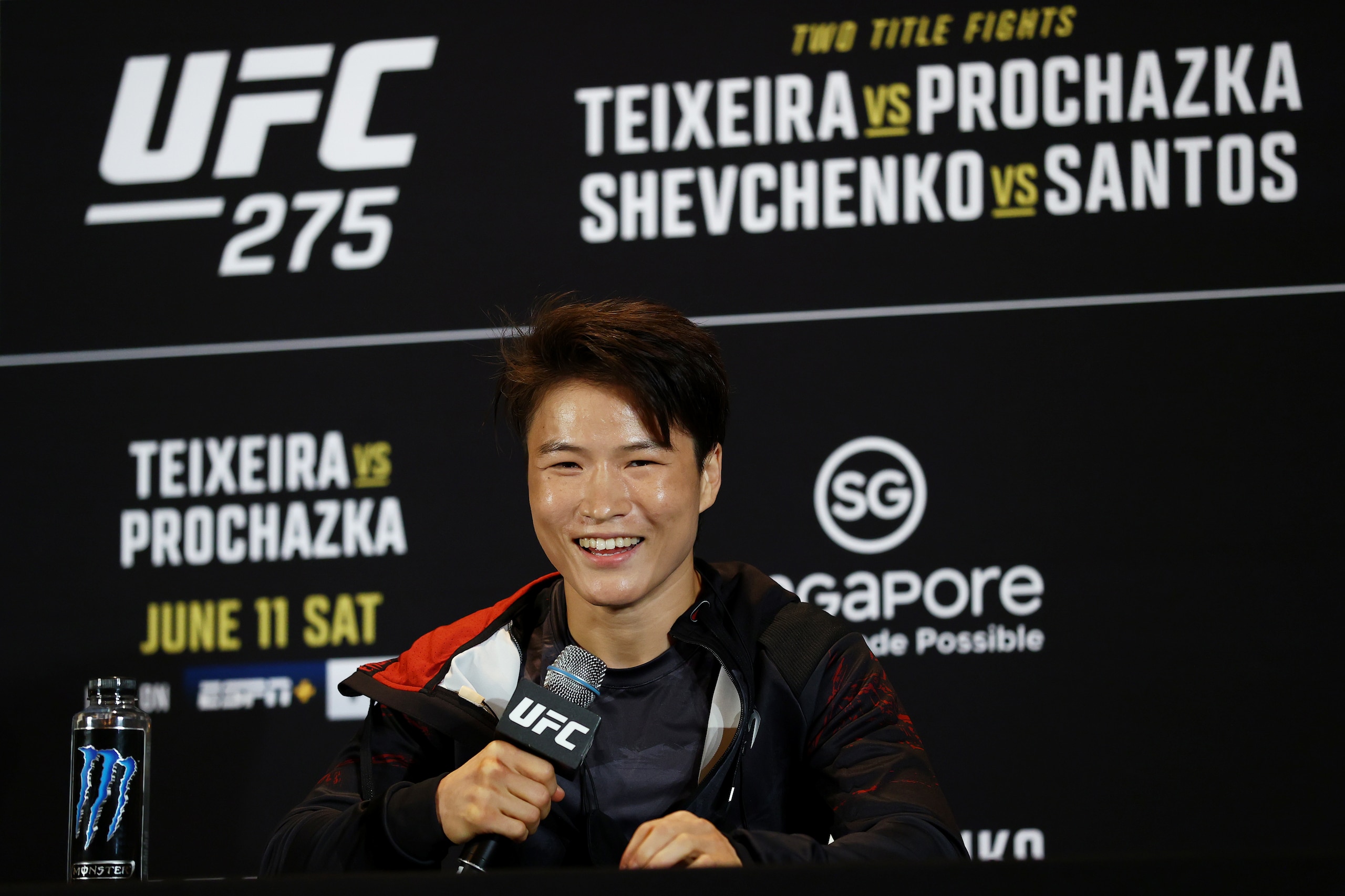 SINGAPORE, SINGAPORE - JUNE 08: Zhang Weili of China fields questions from the media ahead of her strawweight bout against Joanna Jedrzejczyk of Poland during UFC 275 Media Day at Mandarin Oriental on June 08, 2022 in Singapore. (Photo by Yong Teck Lim/Getty Images)