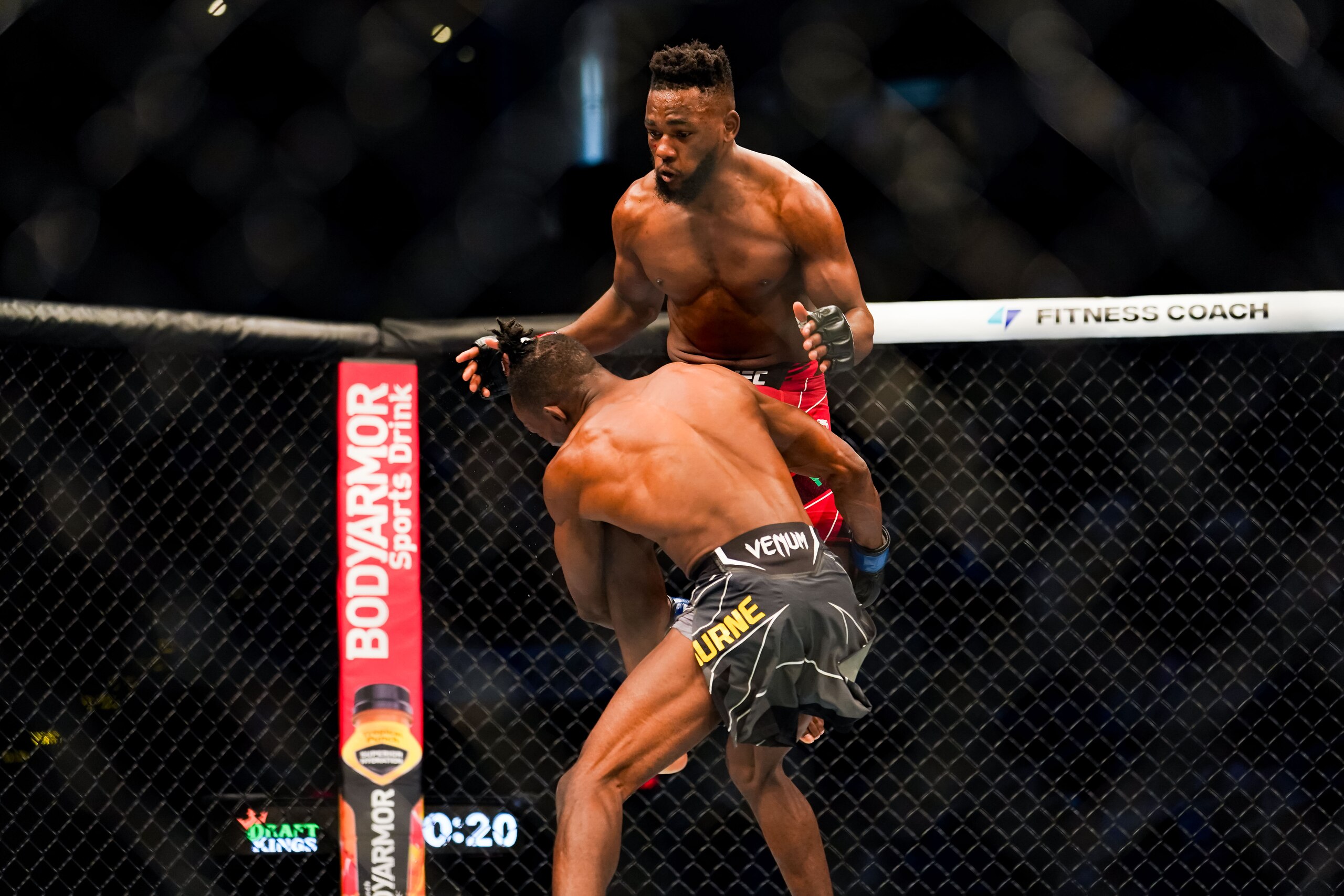 HOUSTON, TX - AUGUST 07: Manel Kape connects a knee with Ode Osbourne during their Flyweight fight at Toyota Center on July 7, 2021 in Houston, Texas. (Photo by Alex Bierens de Haan/Getty Images )