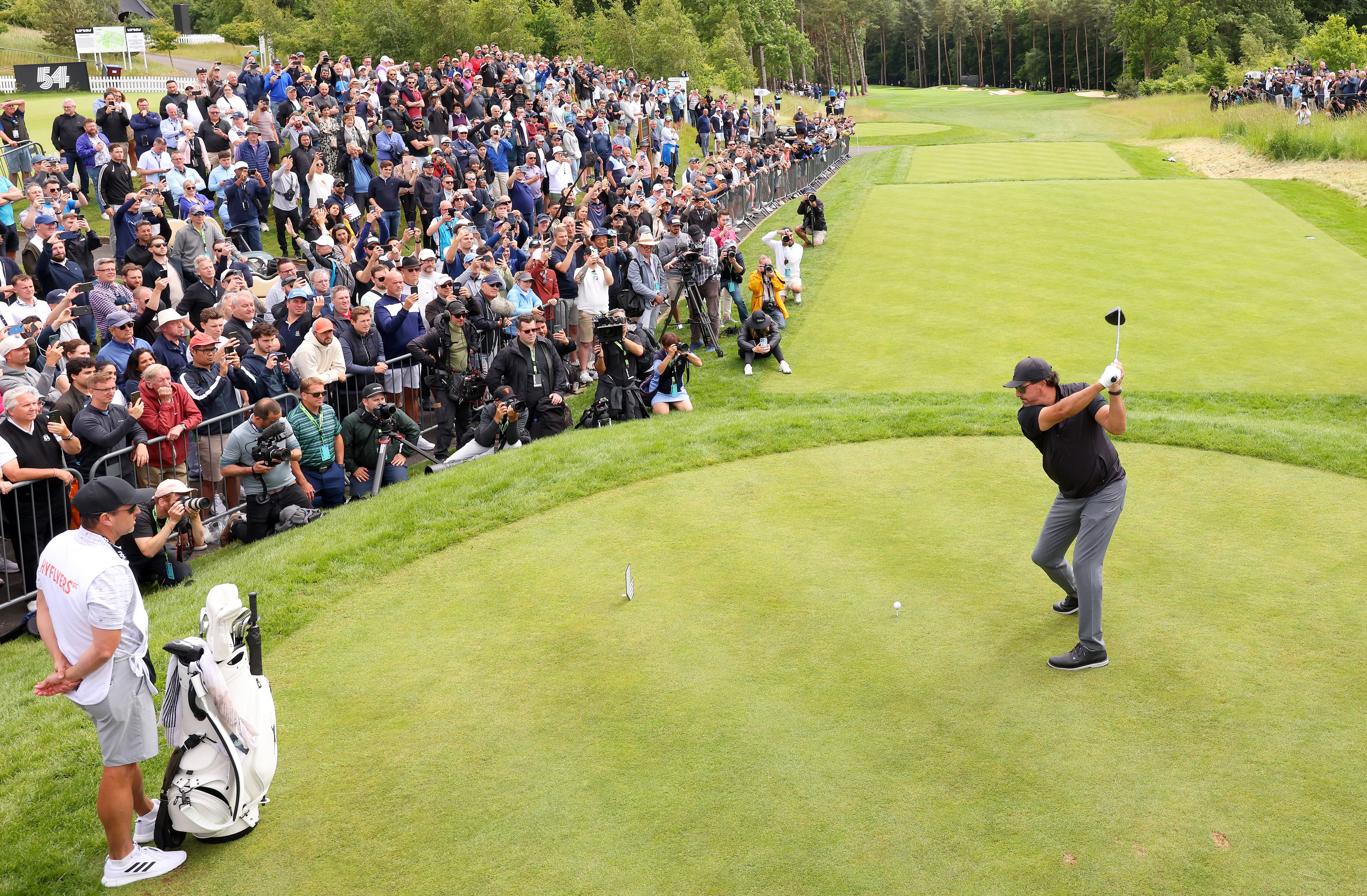 ST ALBANS, ENGLAND - JUNE 09: Phil Mickelson of Hy Flyers GC tees off on the 1st hole during day one of the LIV Golf Invitational - London at The Centurion Club on June 09, 2022 in St Albans, England. (Photo by Chris Trotman/LIV Golf/Getty Images)