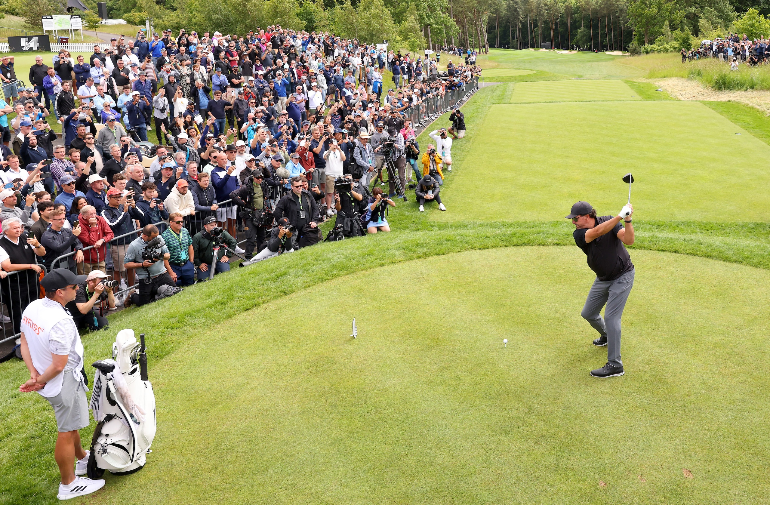 ST ALBANS, ENGLAND - JUNE 09: Phil Mickelson of Hy Flyers GC tees off on the 1st hole during day one of the LIV Golf Invitational - London at The Centurion Club on June 09, 2022 in St Albans, England. (Photo by Chris Trotman/LIV Golf/Getty Images)