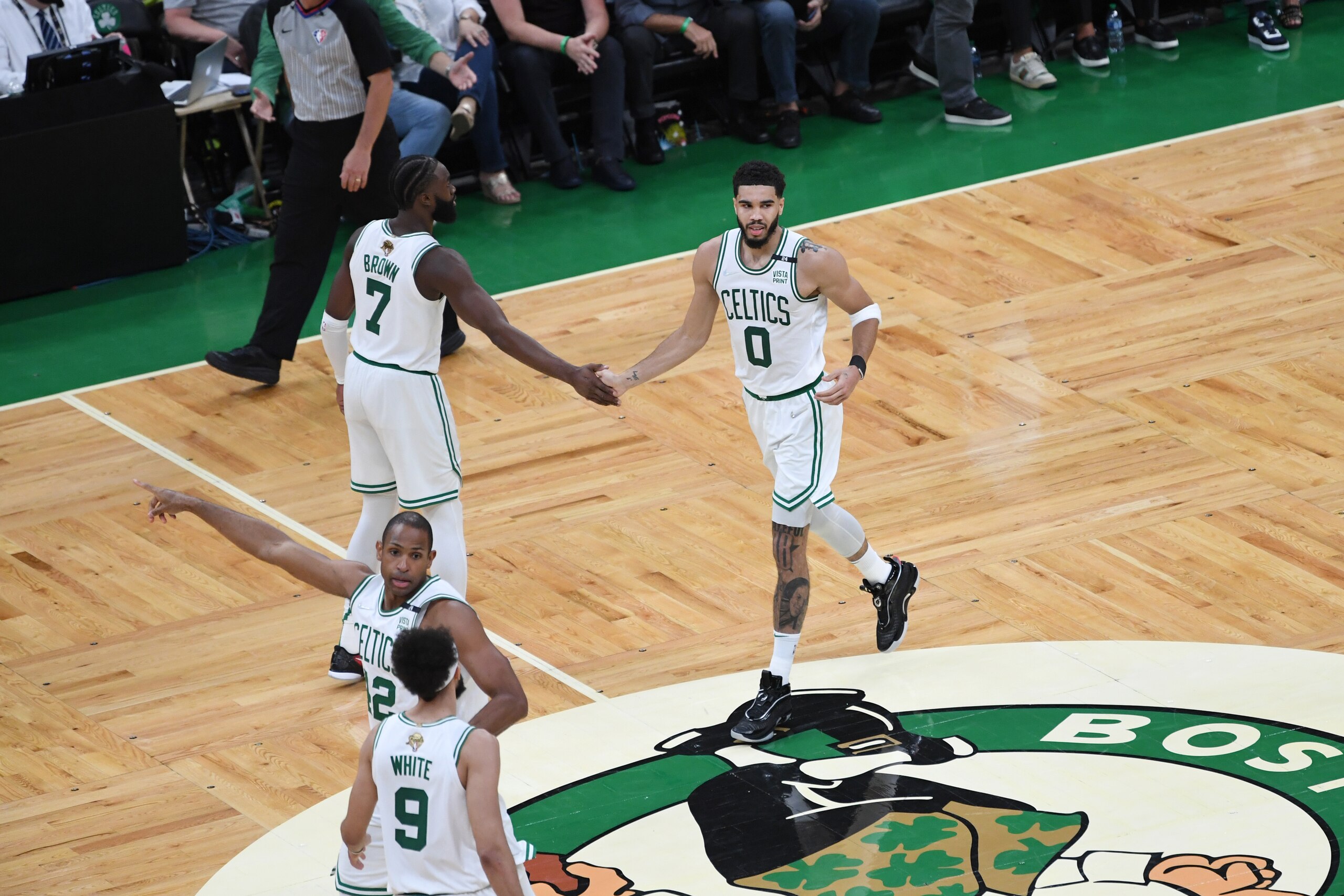 BOSTON, MA - JUNE 8: Jaylen Brown #7 high fives Jayson Tatum #0 of the Boston Celtics during Game Three of the 2022 NBA Finals on June 8, 2022 at TD Garden in Boston, Massachusetts. NOTE TO USER: User expressly acknowledges and agrees that, by downloading and or using this photograph, user is consenting to the terms and conditions of Getty Images License Agreement. Mandatory Copyright Notice: Copyright 2022 NBAE (Photo by Noah Graham/NBAE via Getty Images)