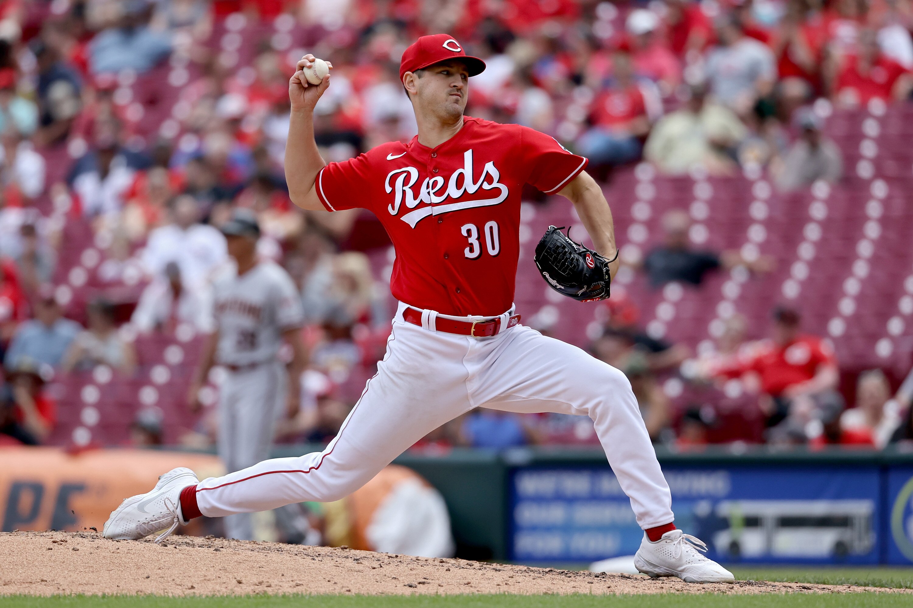 CINCINNATI, OHIO - JUNE 09: Tyler Mahle #30 of the Cincinnati Reds pitches in the sixth inning against the Arizona Diamondbacks at Great American Ball Park on June 09, 2022 in Cincinnati, Ohio. (Photo by Dylan Buell/Getty Images)