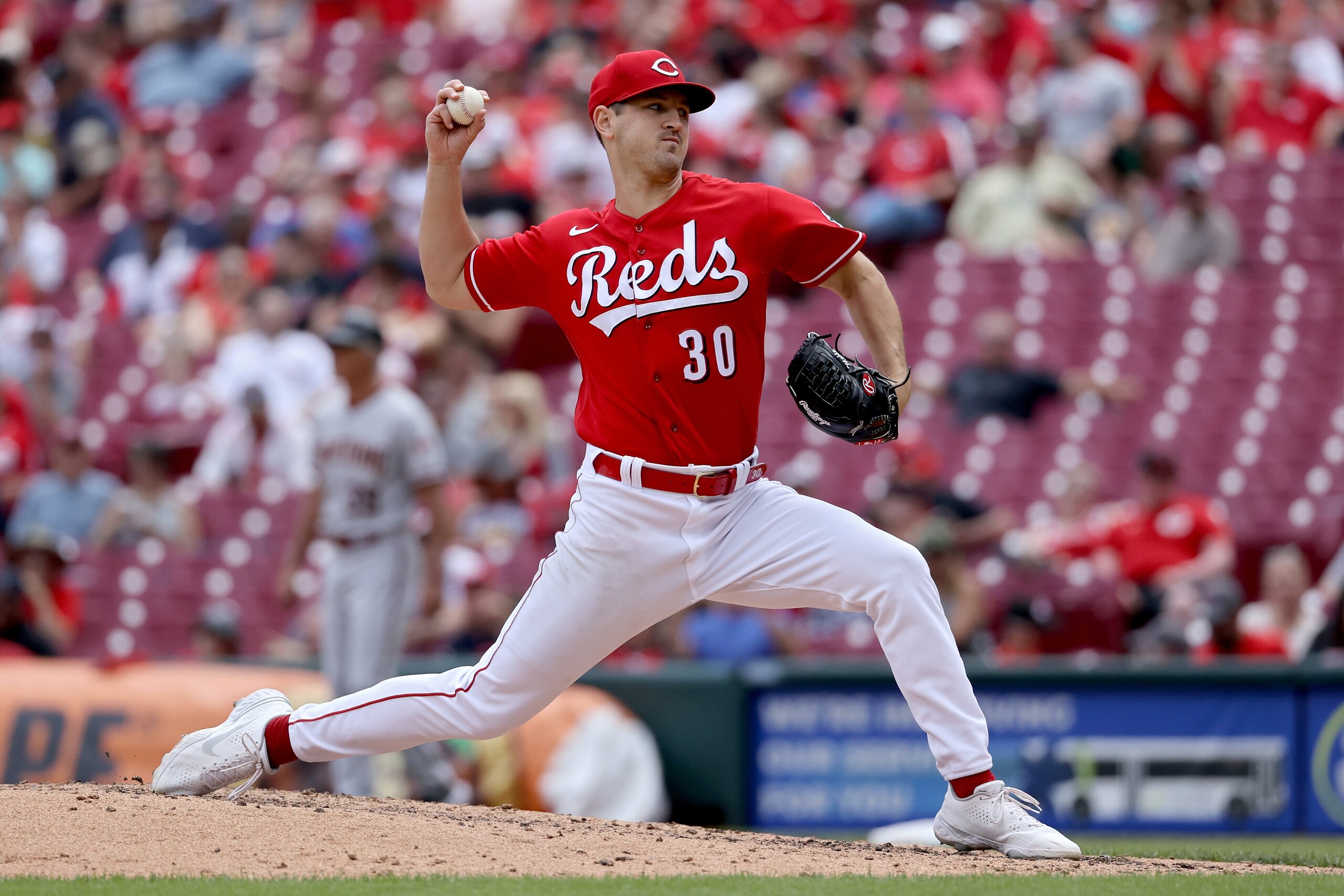 CINCINNATI, OHIO - JUNE 09: Tyler Mahle #30 of the Cincinnati Reds pitches in the sixth inning against the Arizona Diamondbacks at Great American Ball Park on June 09, 2022 in Cincinnati, Ohio. (Photo by Dylan Buell/Getty Images)